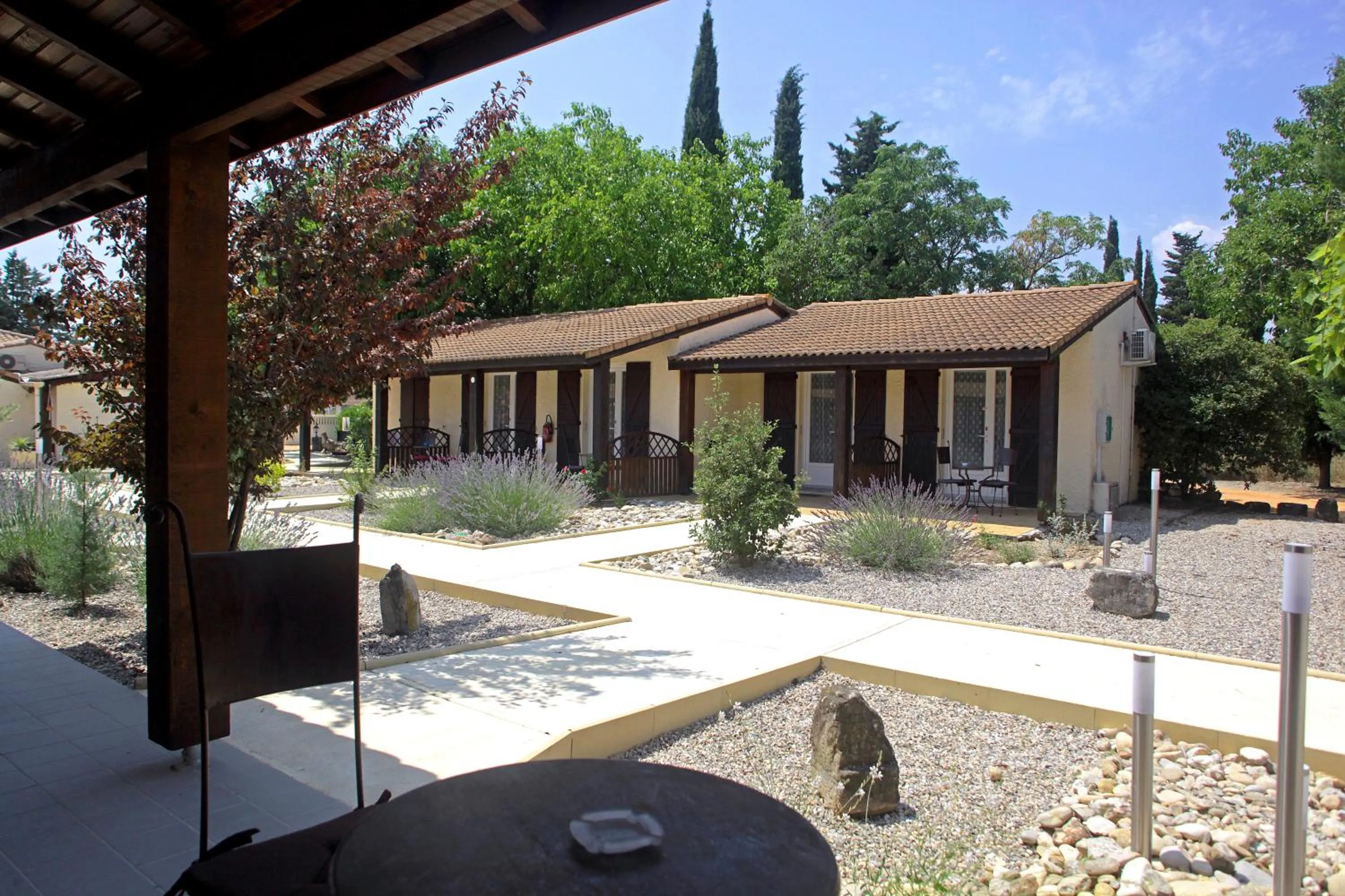 Patio in Logis Hotel Le Vieux Moulin