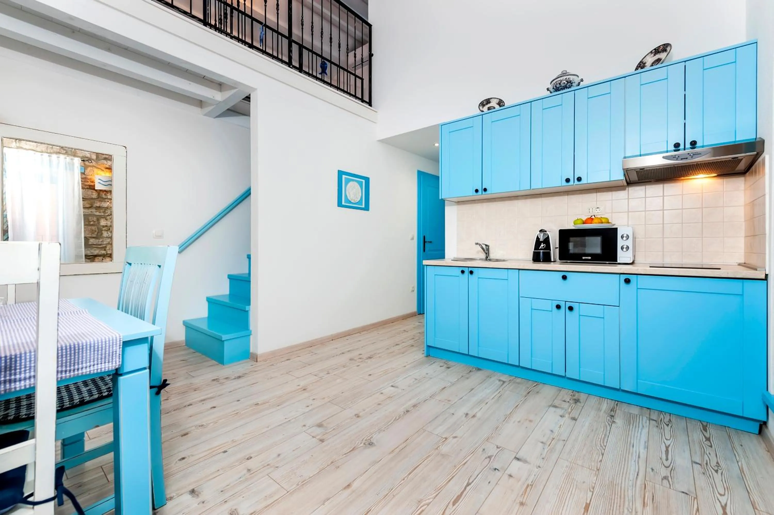 Kitchen or kitchenette, Bed in Apartments & Rooms La casa Barbaro