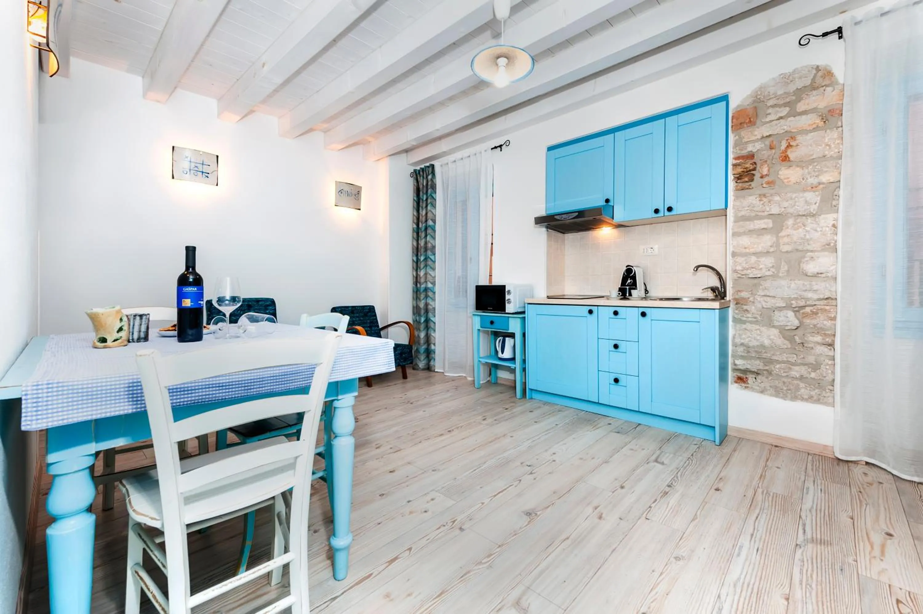Kitchen or kitchenette in Apartments & Rooms La casa Barbaro