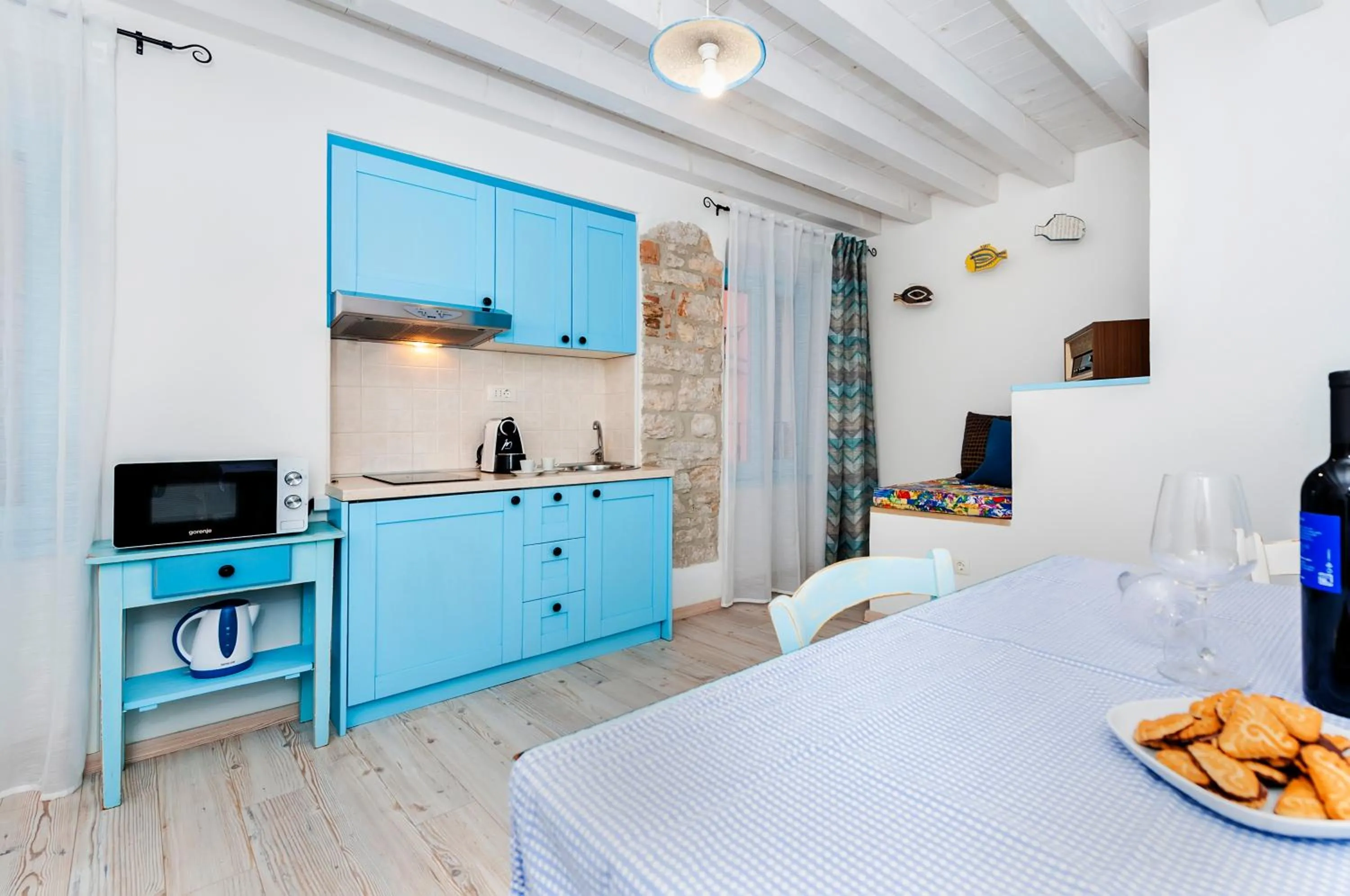Kitchen or kitchenette, Bed in Apartments & Rooms La casa Barbaro