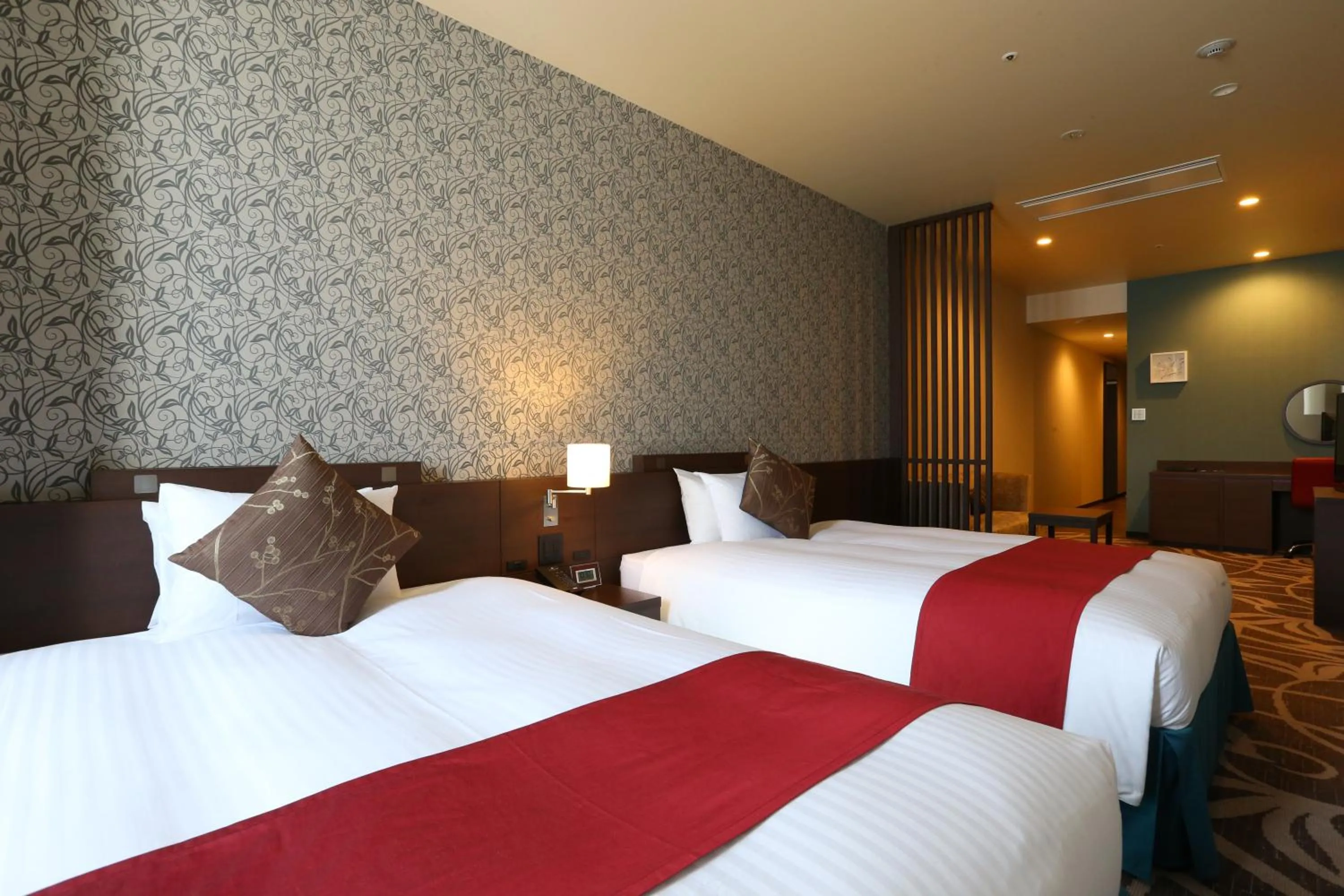 Bed in Hotel La Raison Osaka