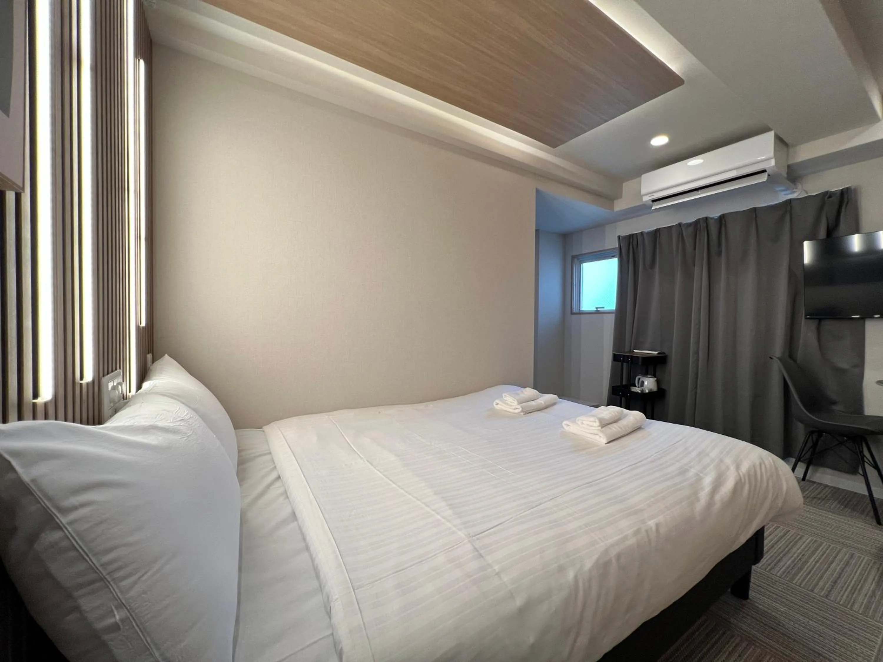 Bed in Osaka Ebisu Hotel