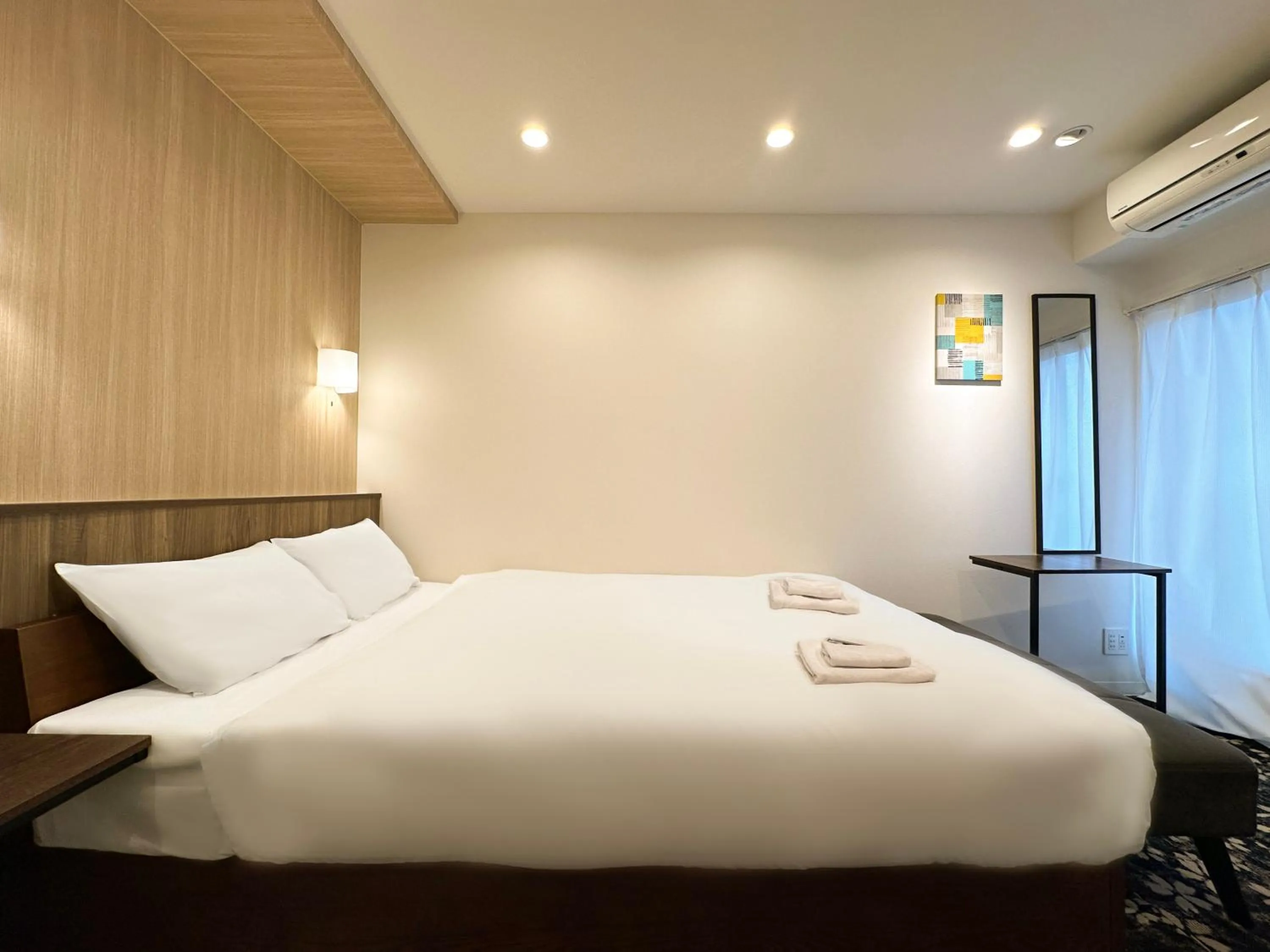 Bed in Osaka Ebisu Hotel