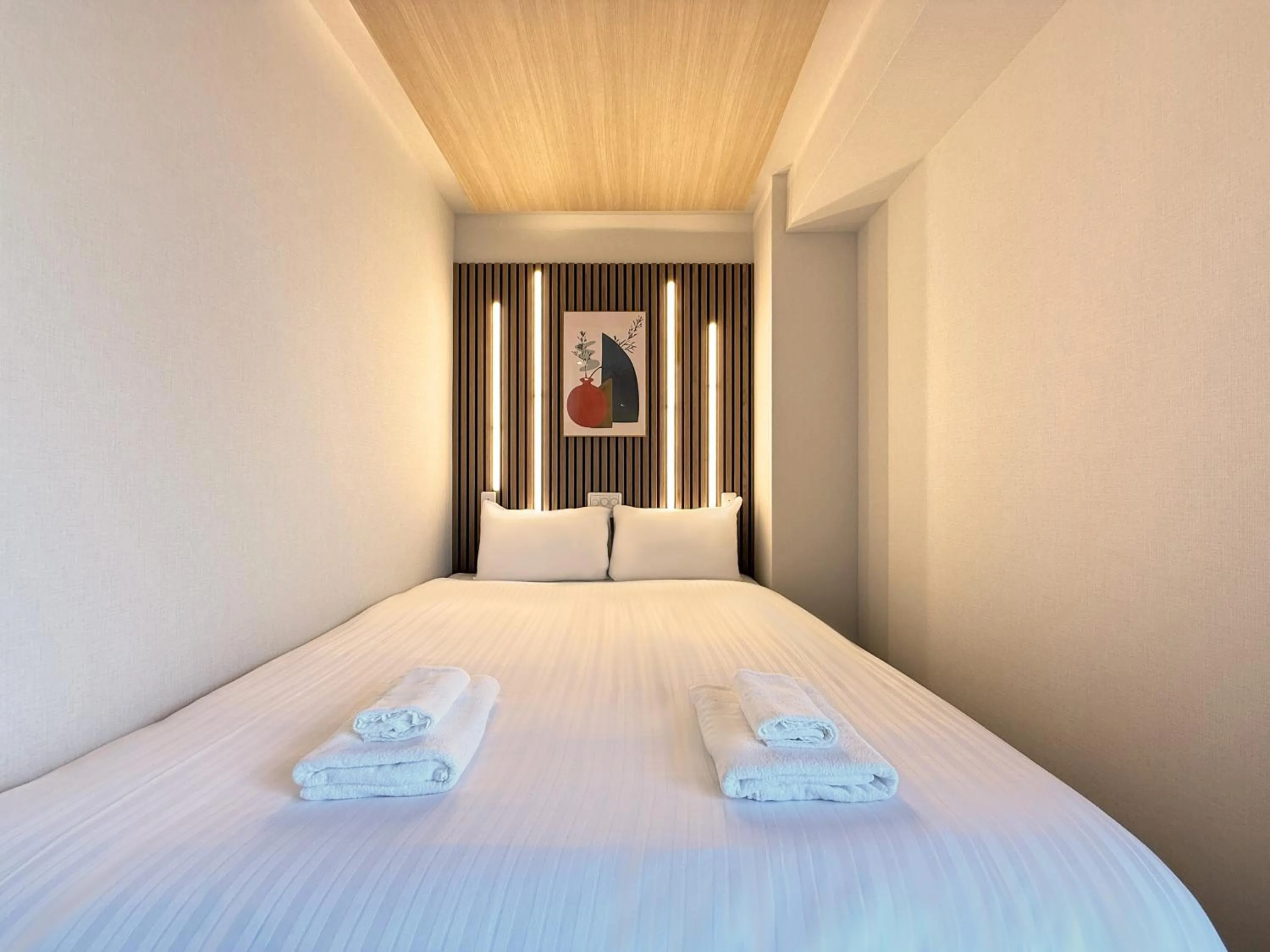 Bed in Osaka Ebisu Hotel