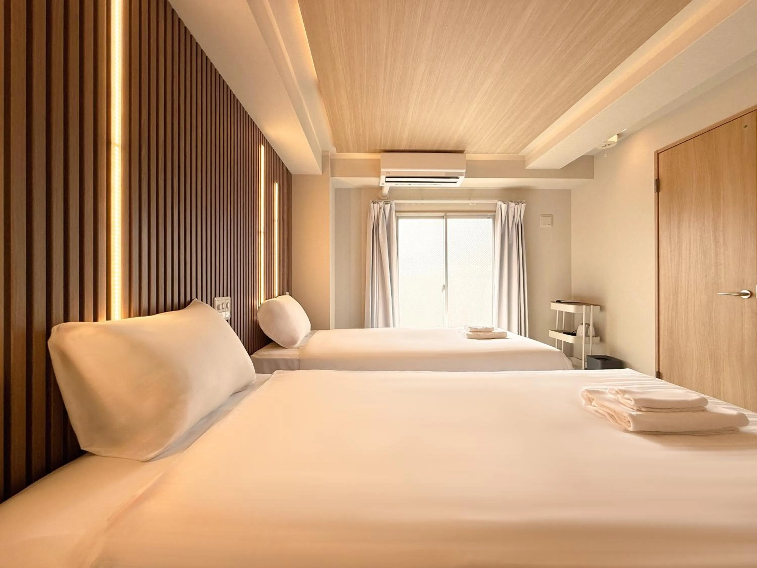 Bed in Osaka Ebisu Hotel