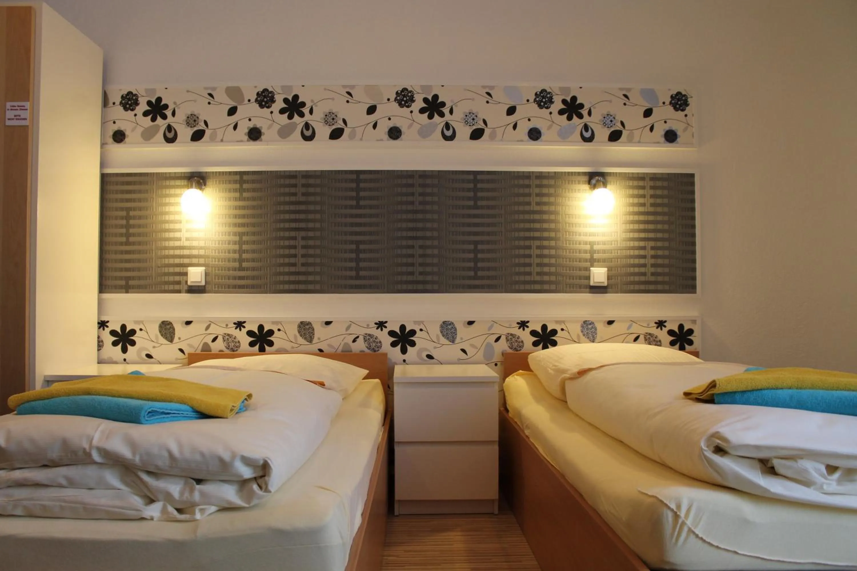 Bed in Pension Central Nuernberg-Fuerth