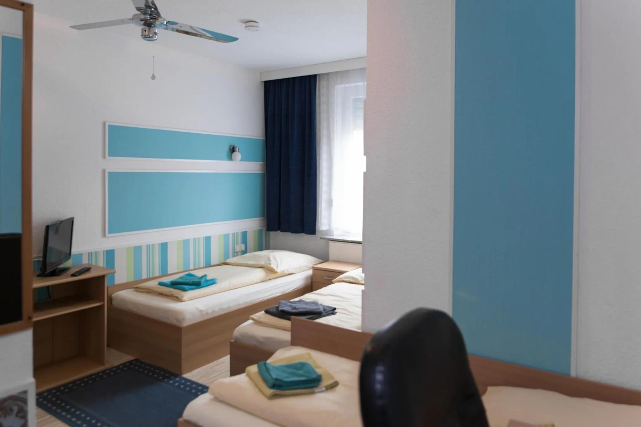 Photo of the whole room, Bed in Pension Central Nuernberg-Fuerth