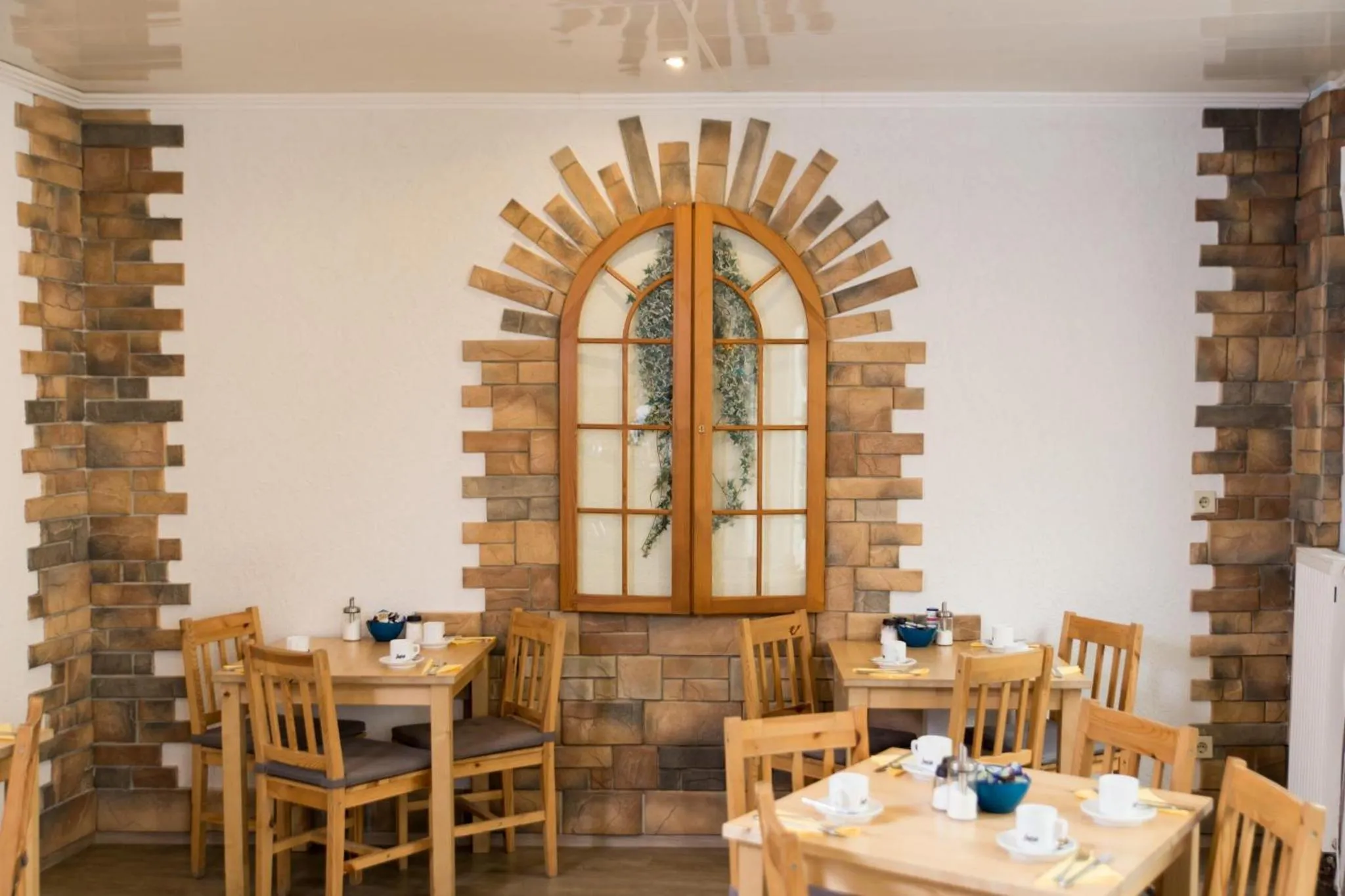 Dining area in Pension Central Nuernberg-Fuerth