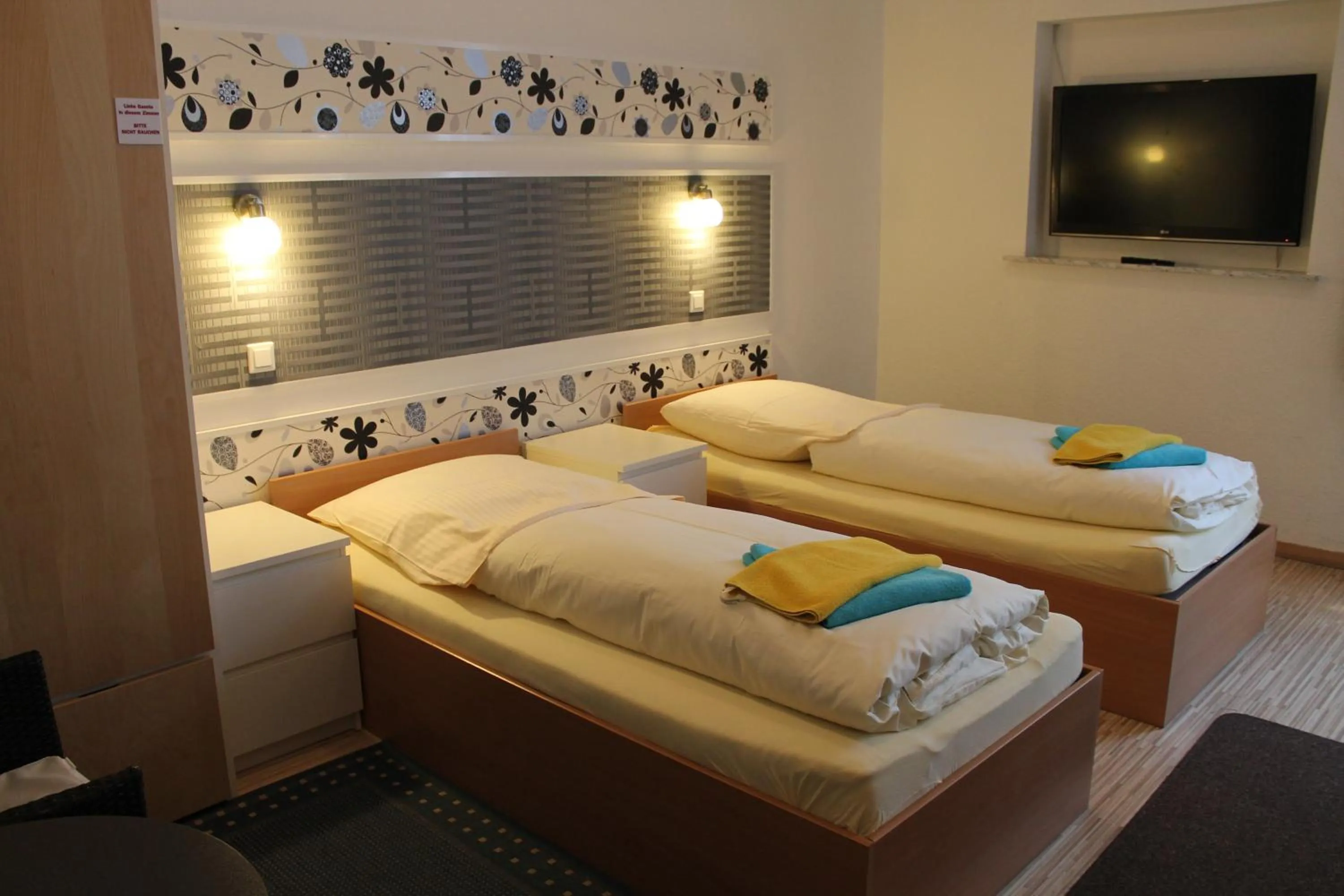 Bed in Pension Central Nuernberg-Fuerth