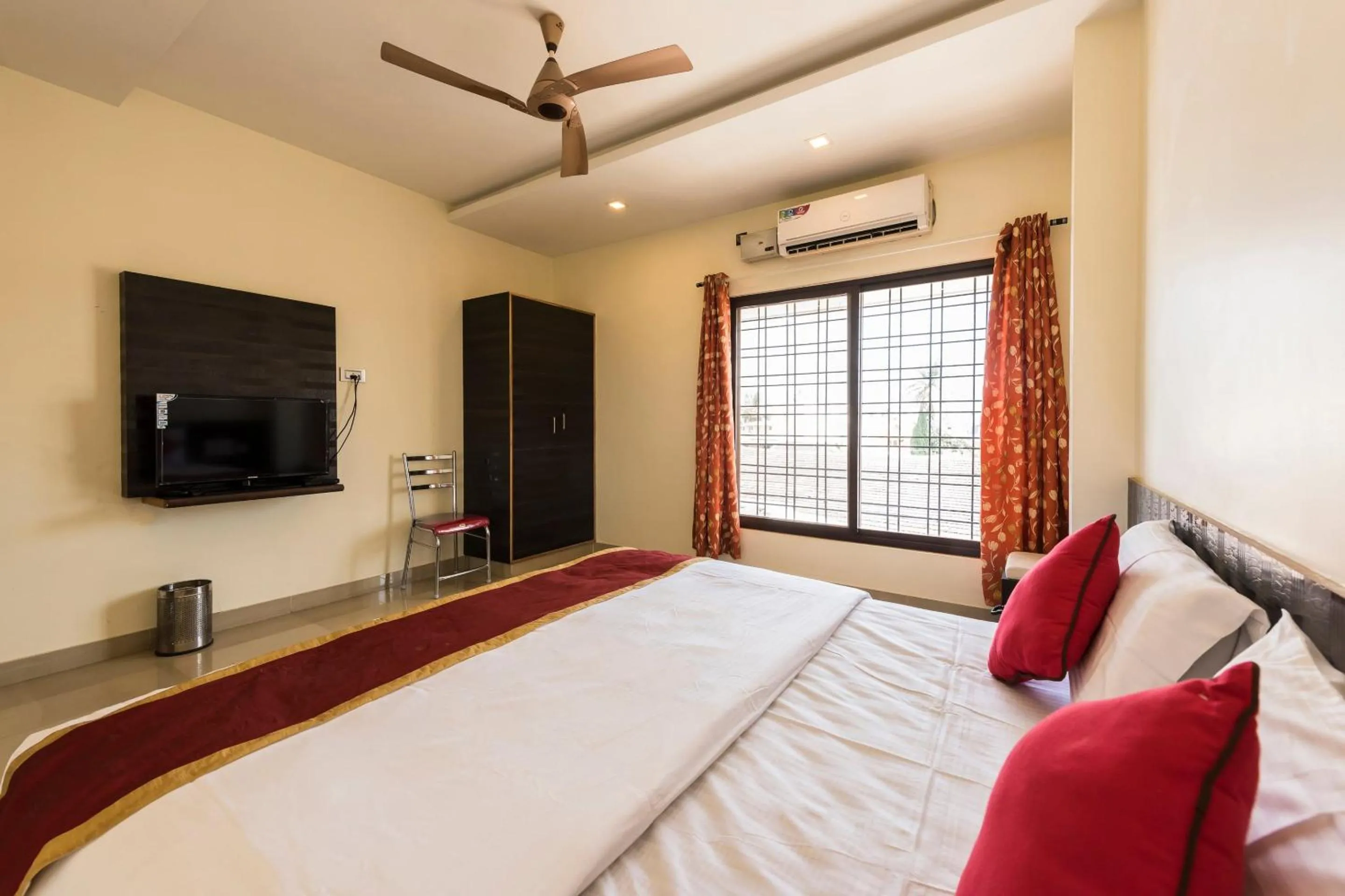 Bedroom in Sai Kalyan suites