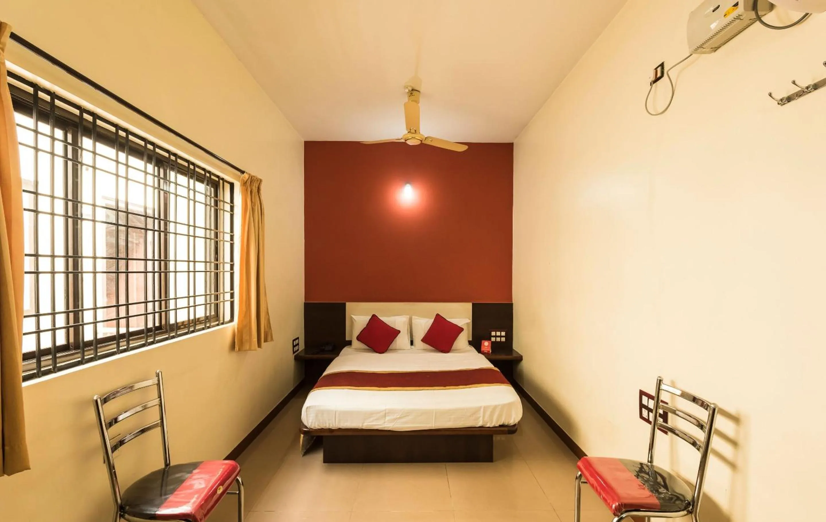 Bedroom in Sai Kalyan suites