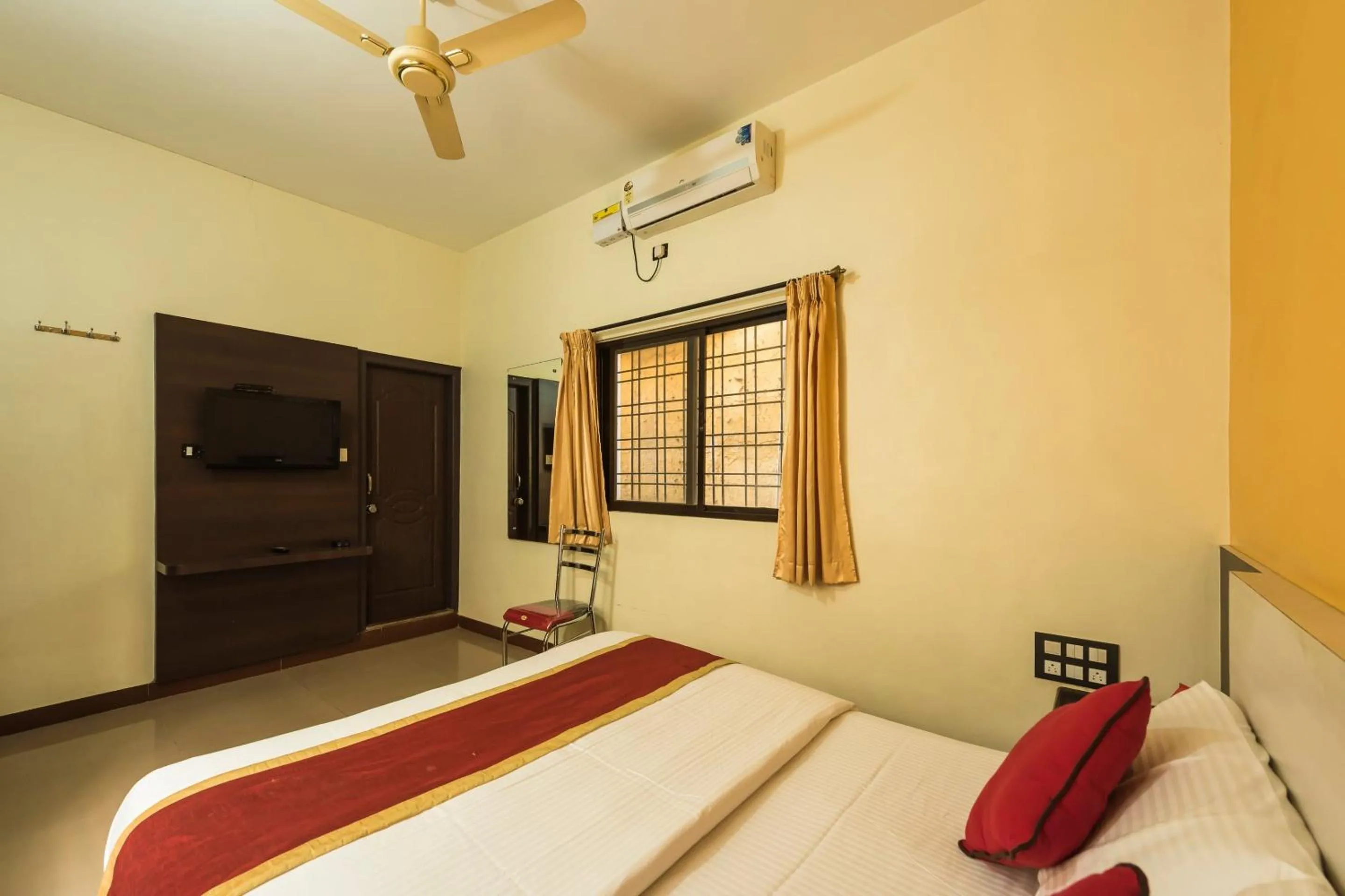 Bedroom in Sai Kalyan suites