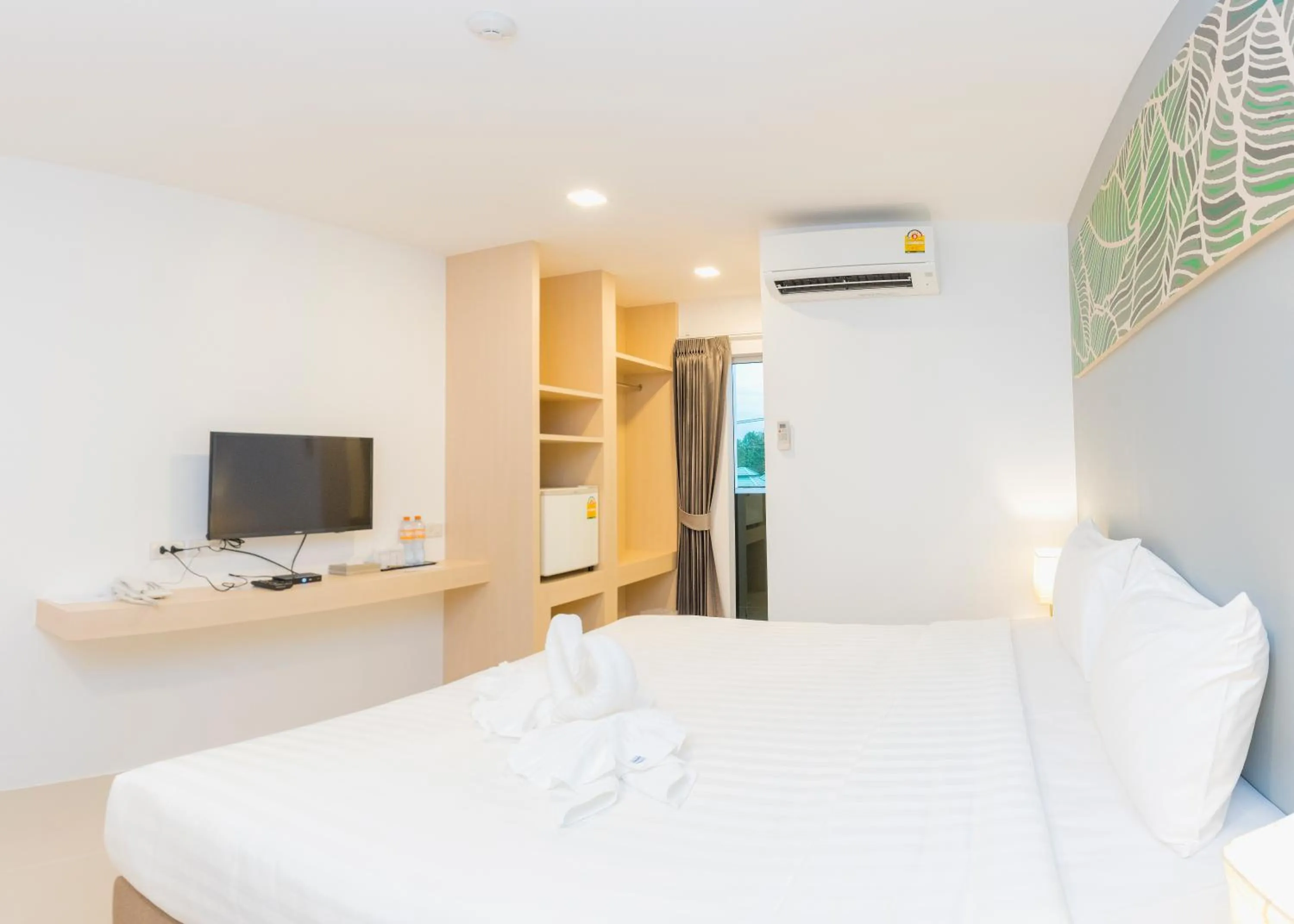 Communal lounge/ TV room in Trat City Hotel