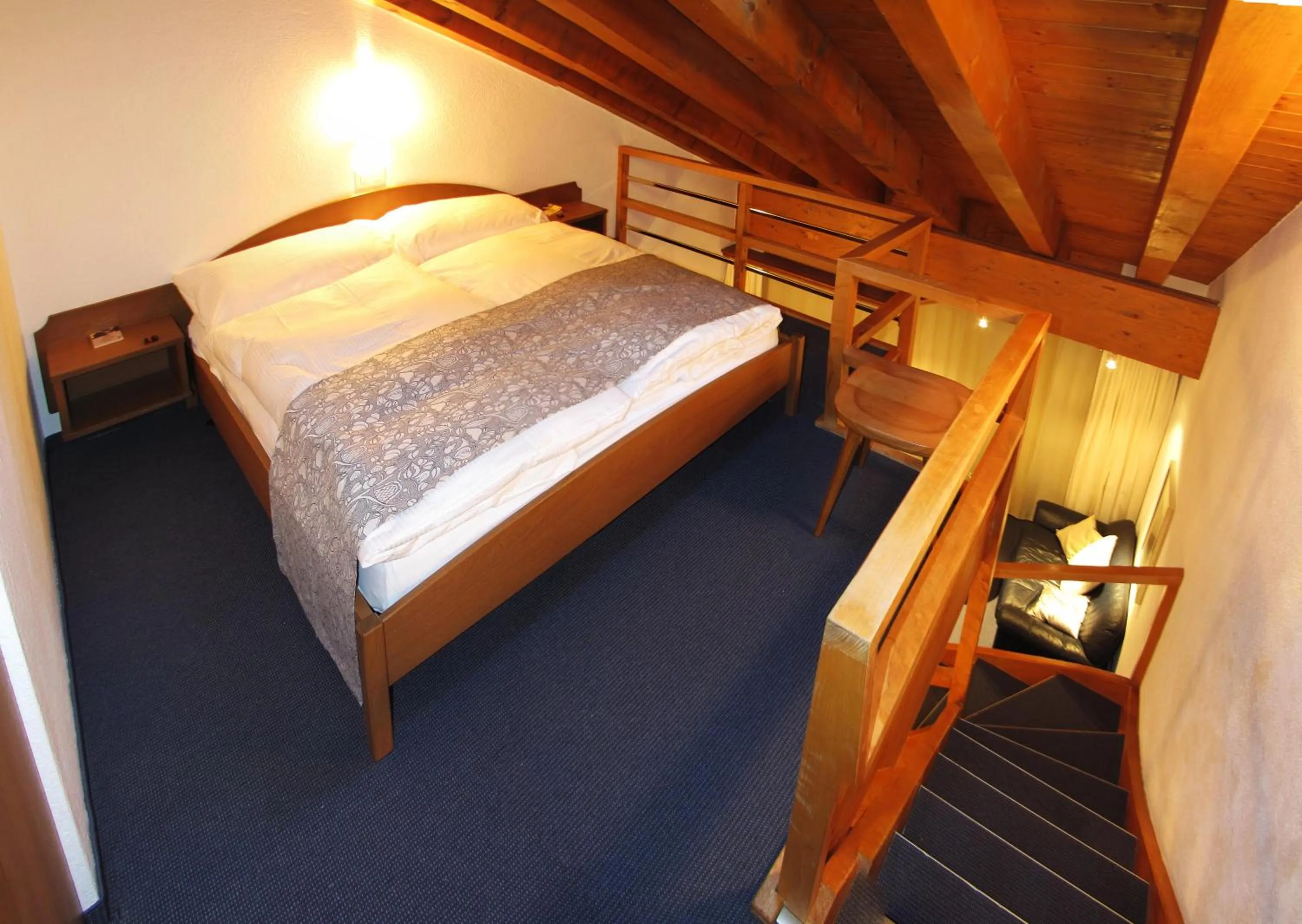 Bed in Hotel Allalin Saas-Fee