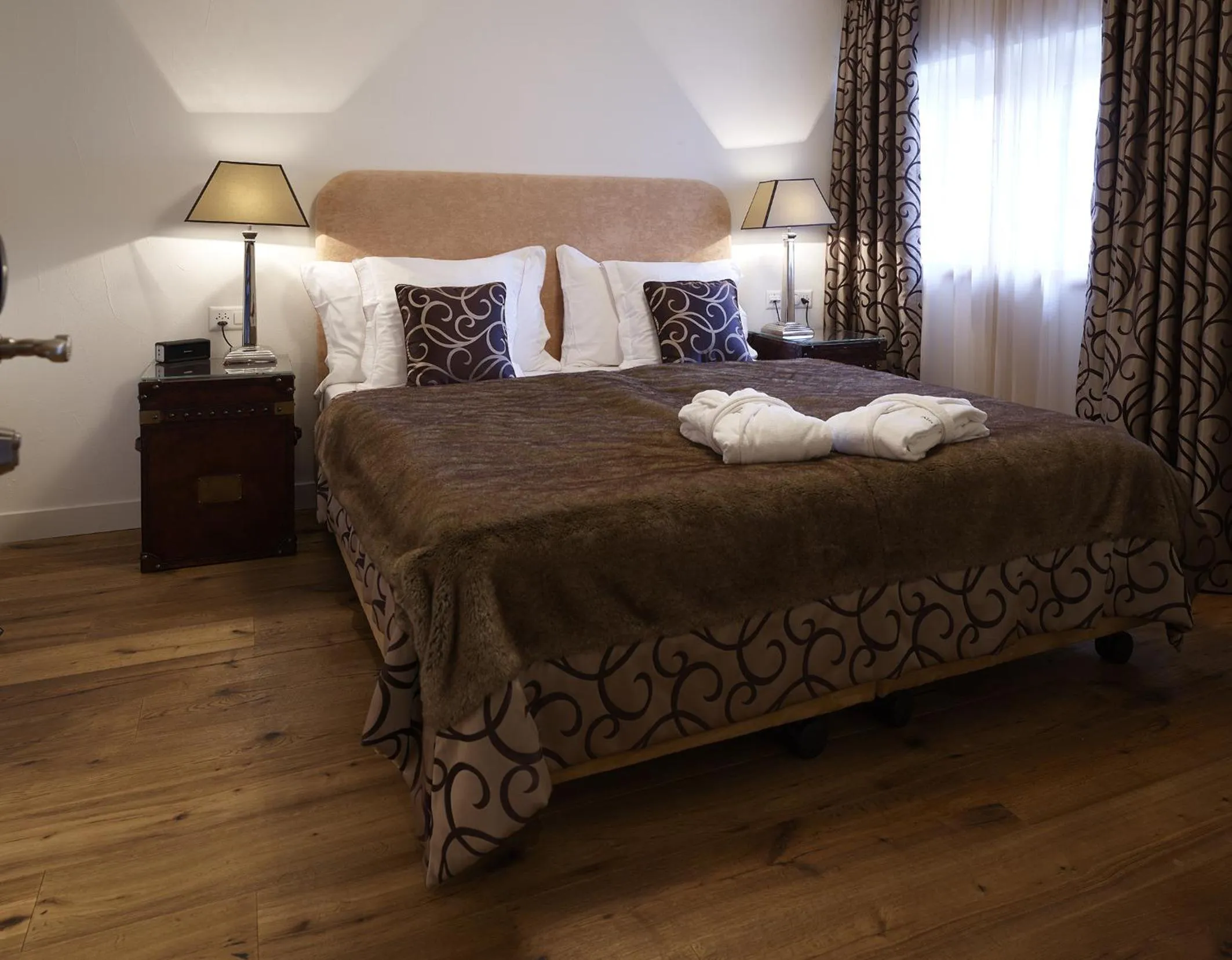 Bed in SchlossHotel Zermatt Active & CBD Spa Hotel