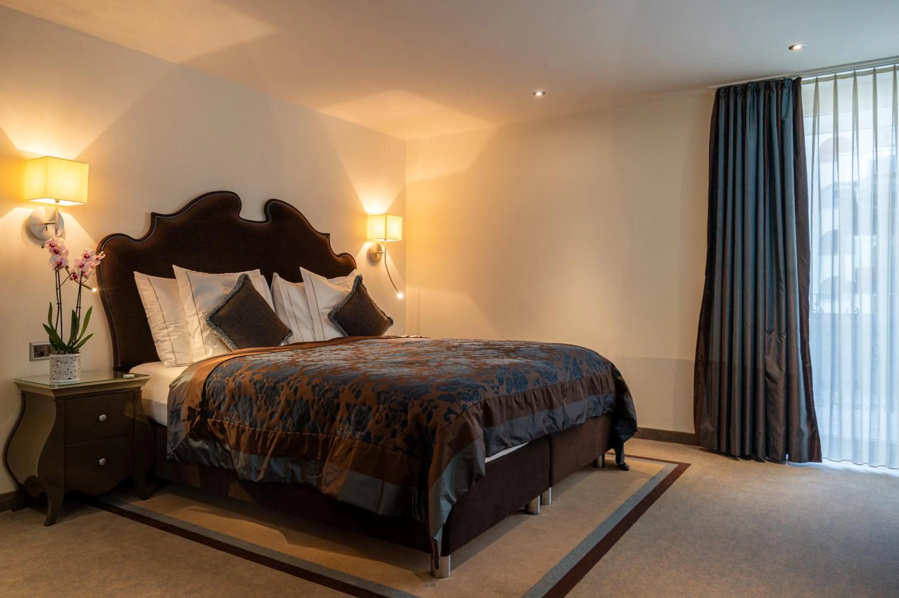 Bedroom in SchlossHotel Zermatt Active & CBD Spa Hotel