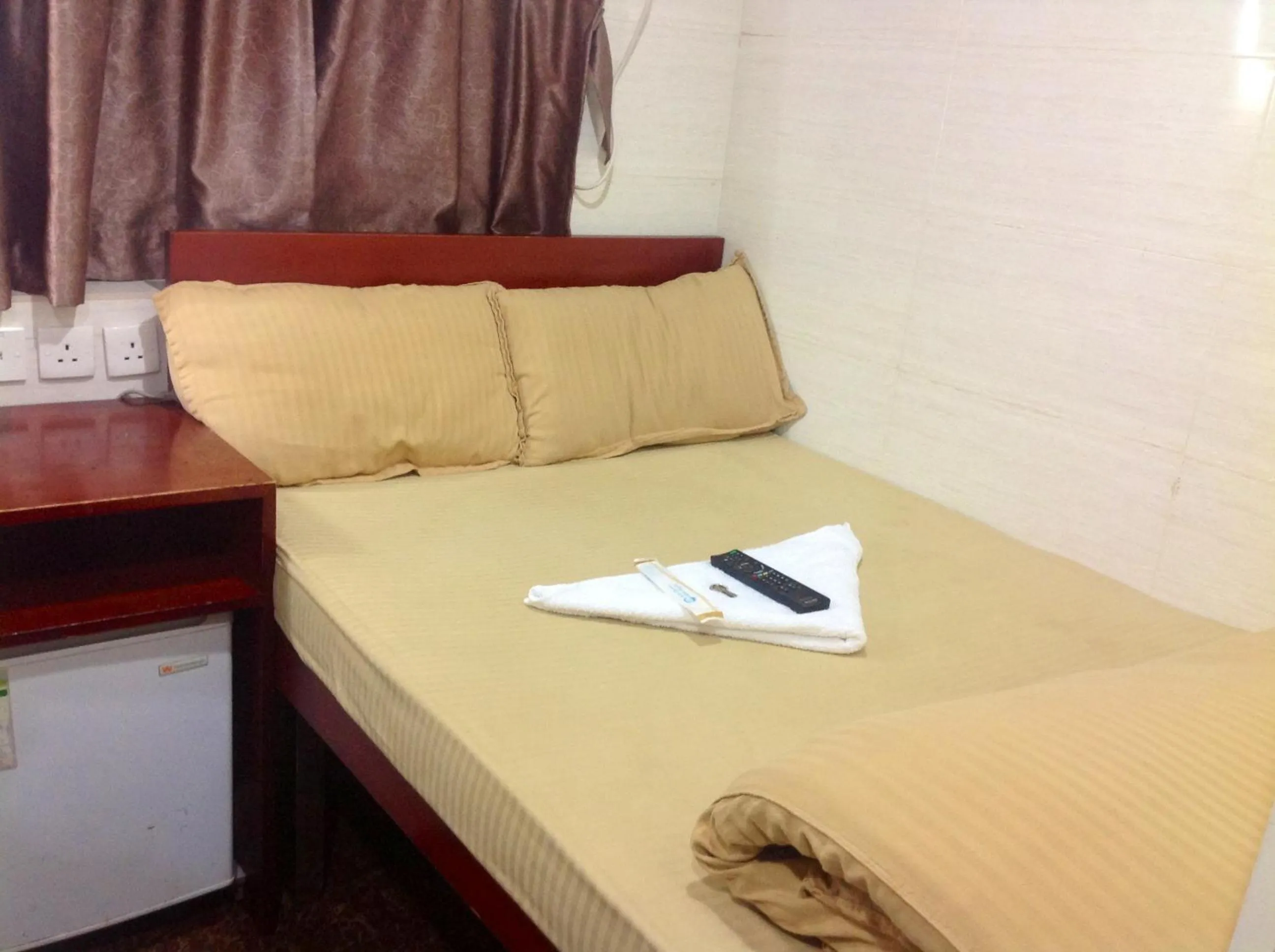 Bed in New Yan Yan Guest House reception 9th floor Flat E4 E6