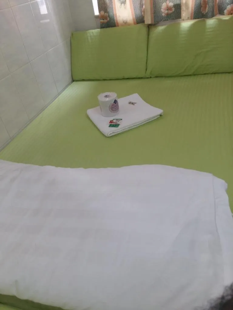 Bed in New Yan Yan Guest House reception 9th floor Flat E4 E6