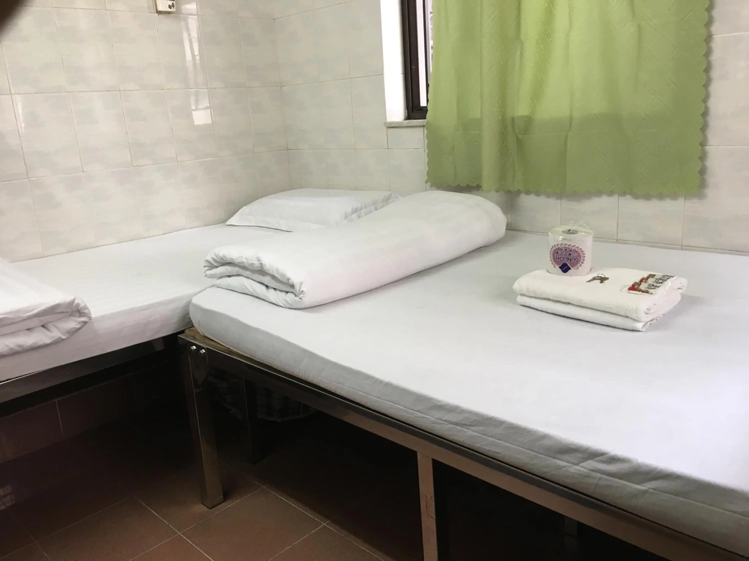 Bed in New Yan Yan Guest House reception 9th floor Flat E4 E6