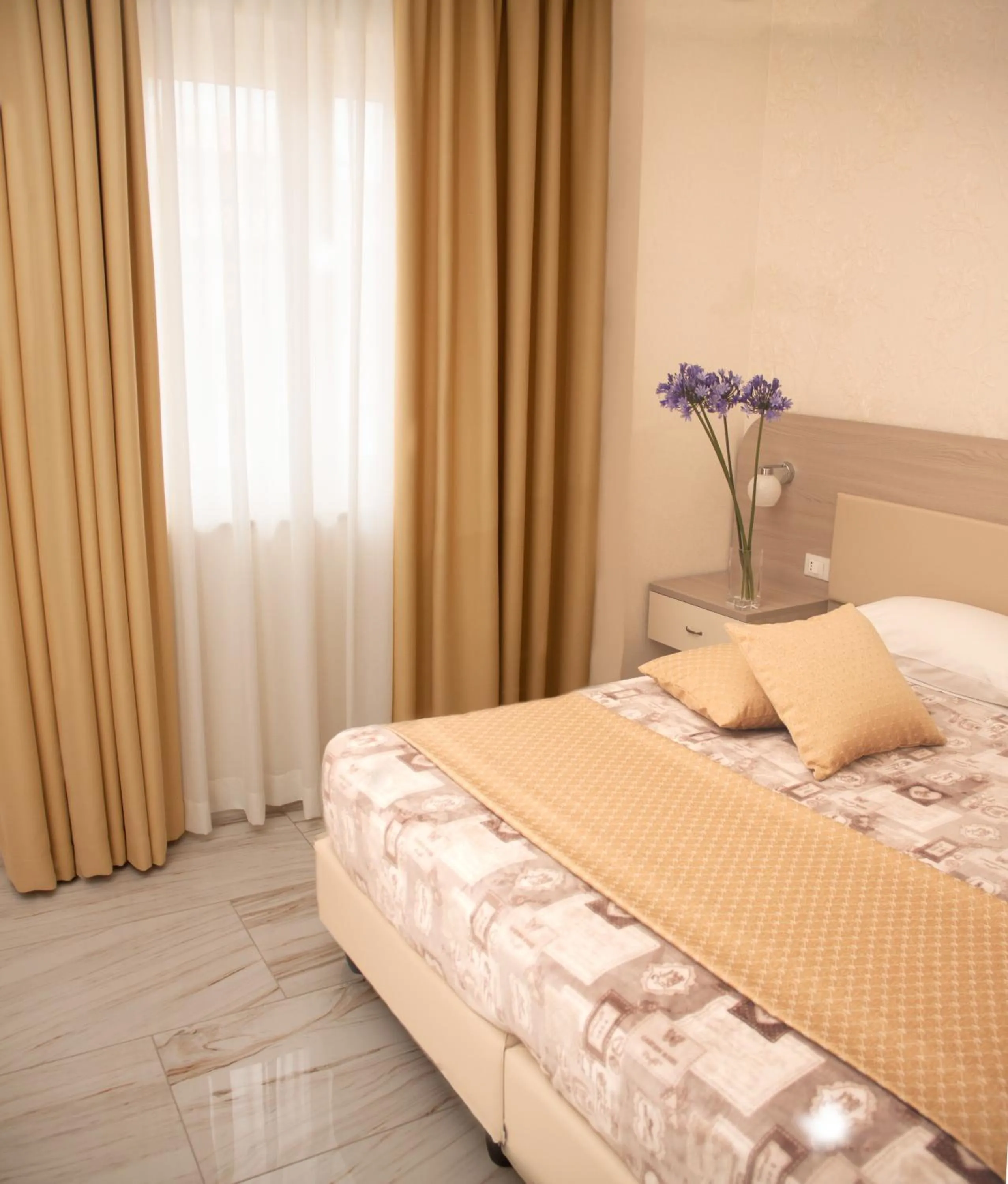 Decorative detail, Bed in Rome Airport Inn