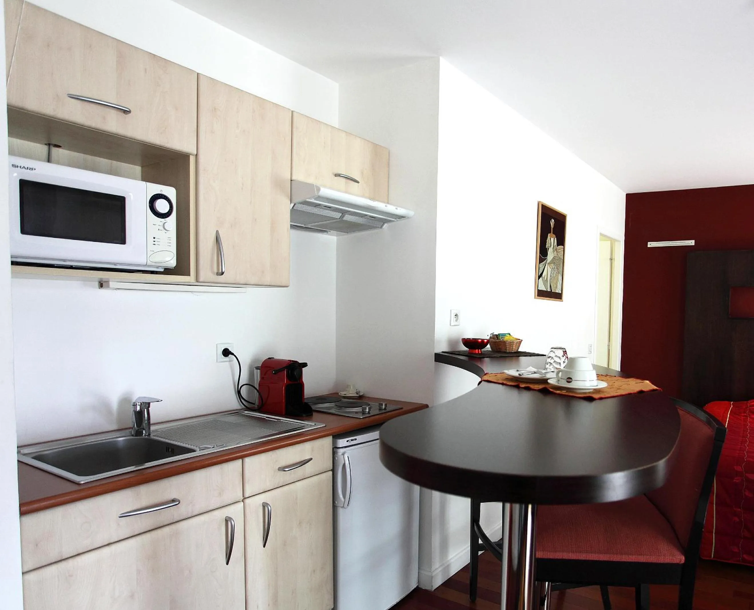 Kitchen or kitchenette in Hôtel la Scala