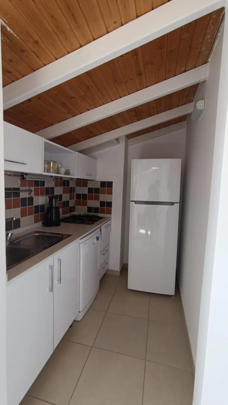 Kitchen or kitchenette in Erdem City Apart