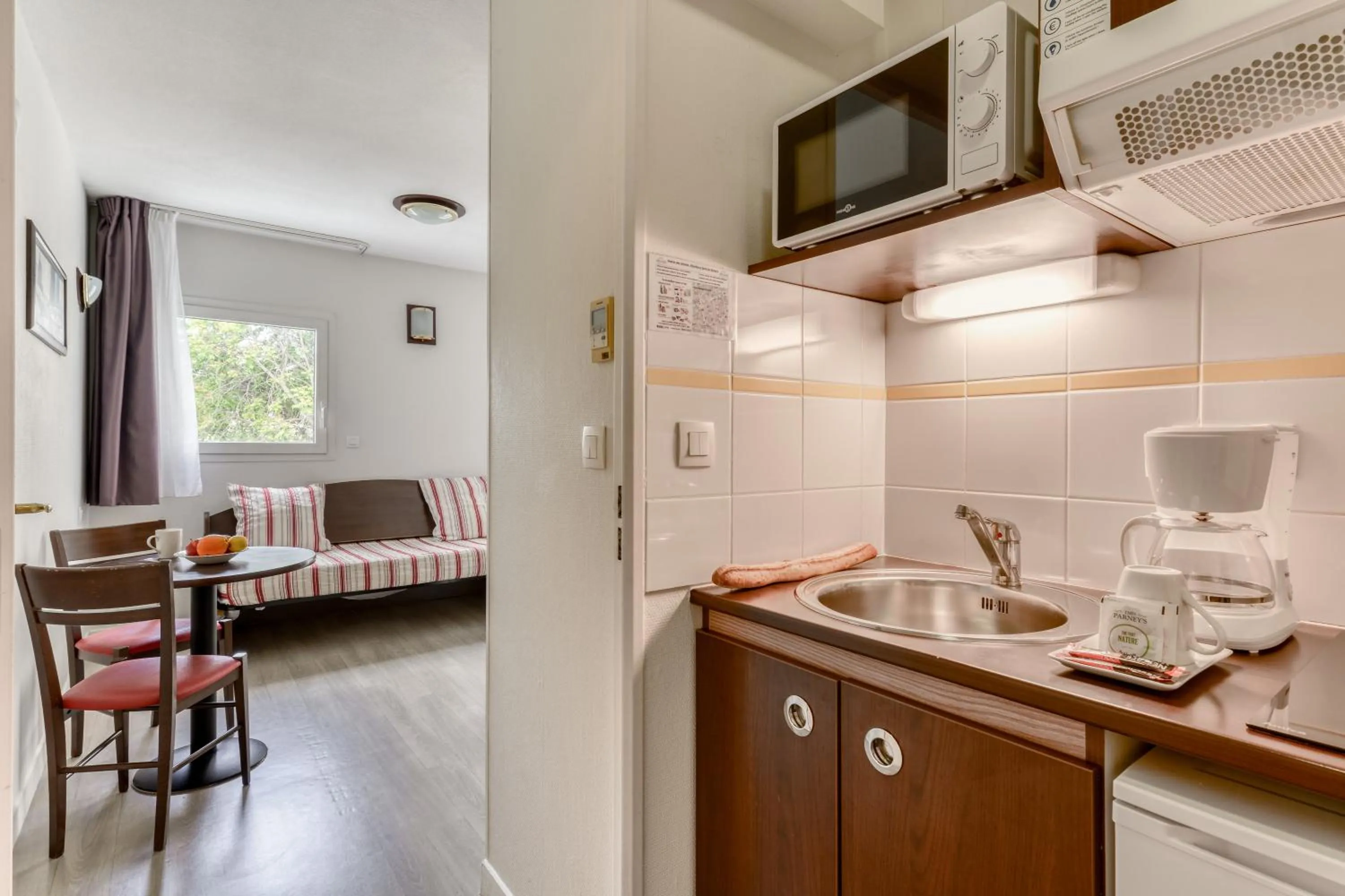 Kitchen or kitchenette in Zenitude Hôtel-Résidences Béziers Centre