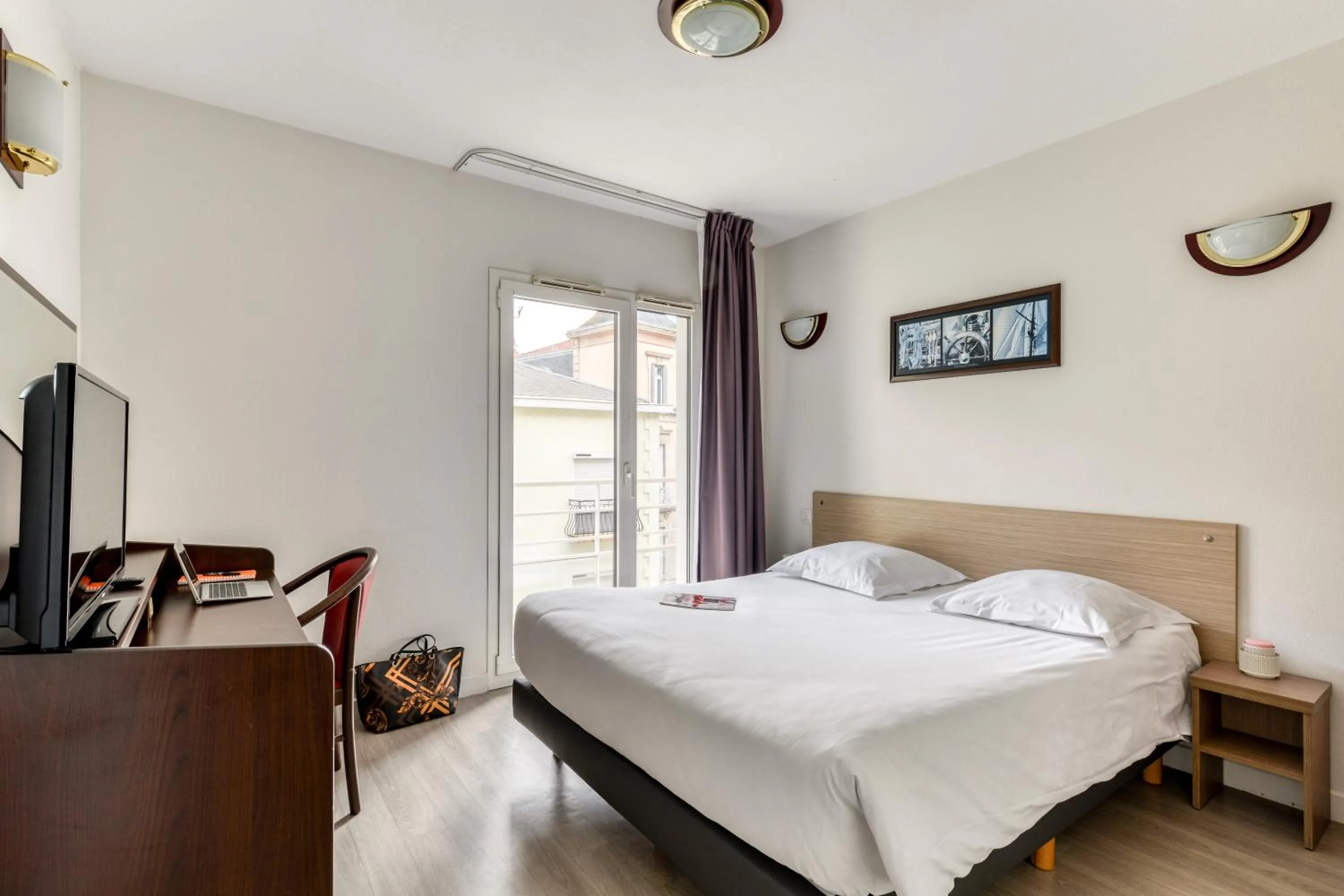 Bed in Zenitude Hôtel-Résidences Béziers Centre