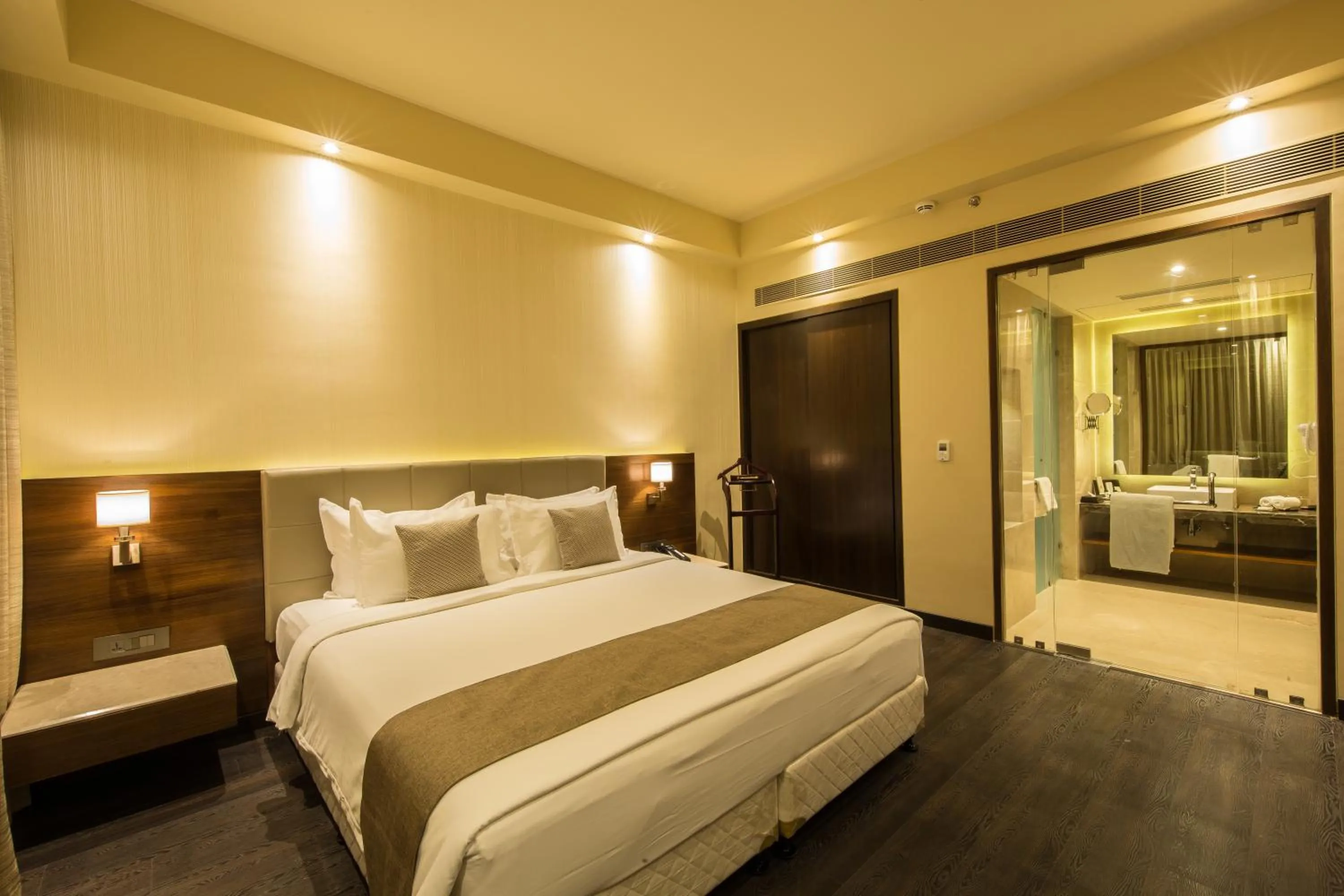 Bedroom, Bed in Iscon The Fern Resort & Spa, Bhavnagar