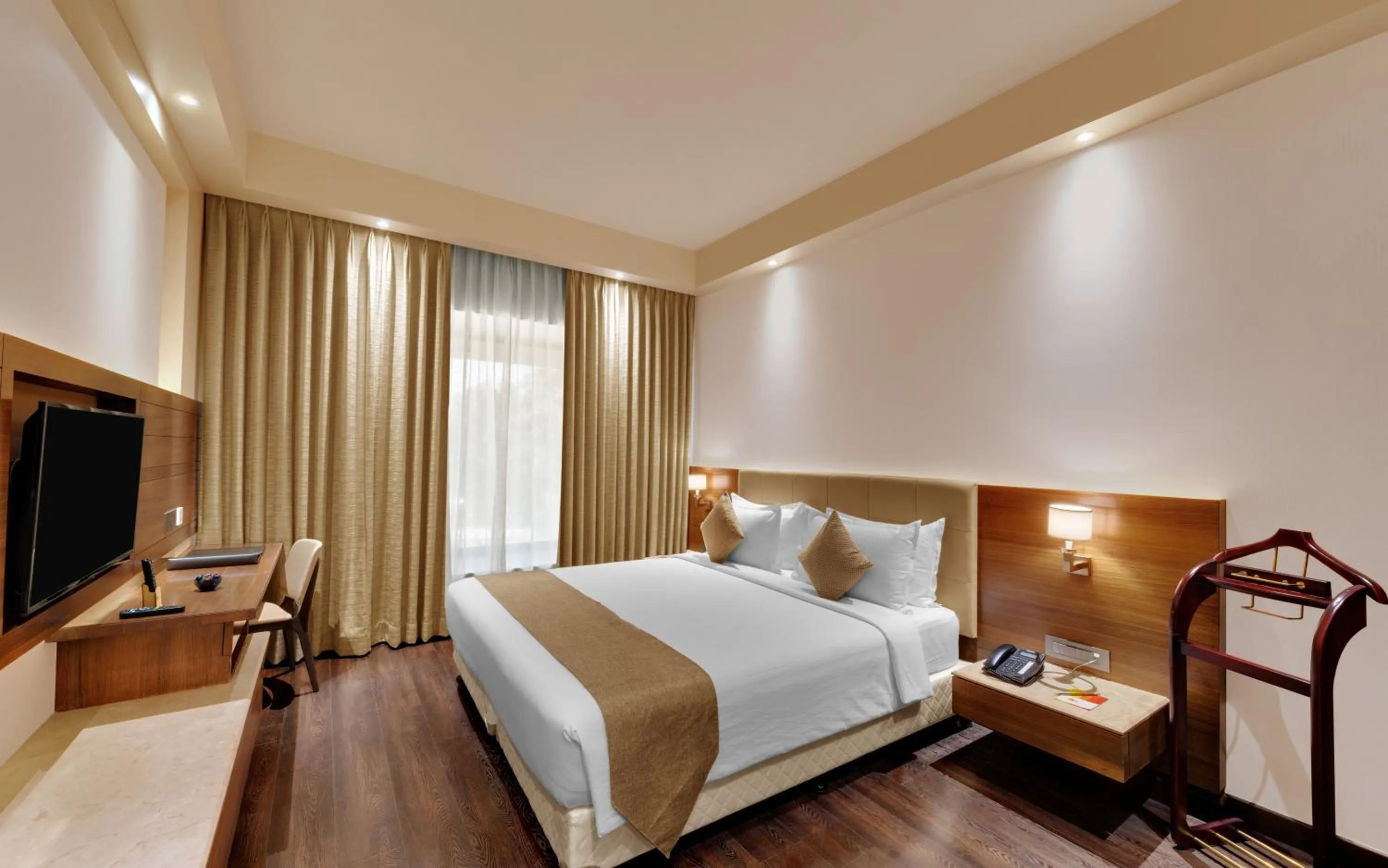 Bedroom, Bed in Iscon The Fern Resort & Spa, Bhavnagar