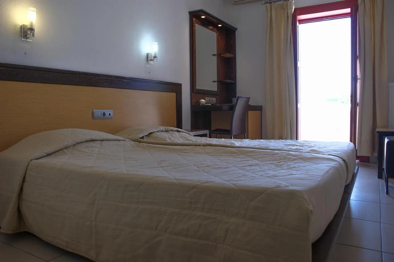 Bed in Aposperides Hotel
