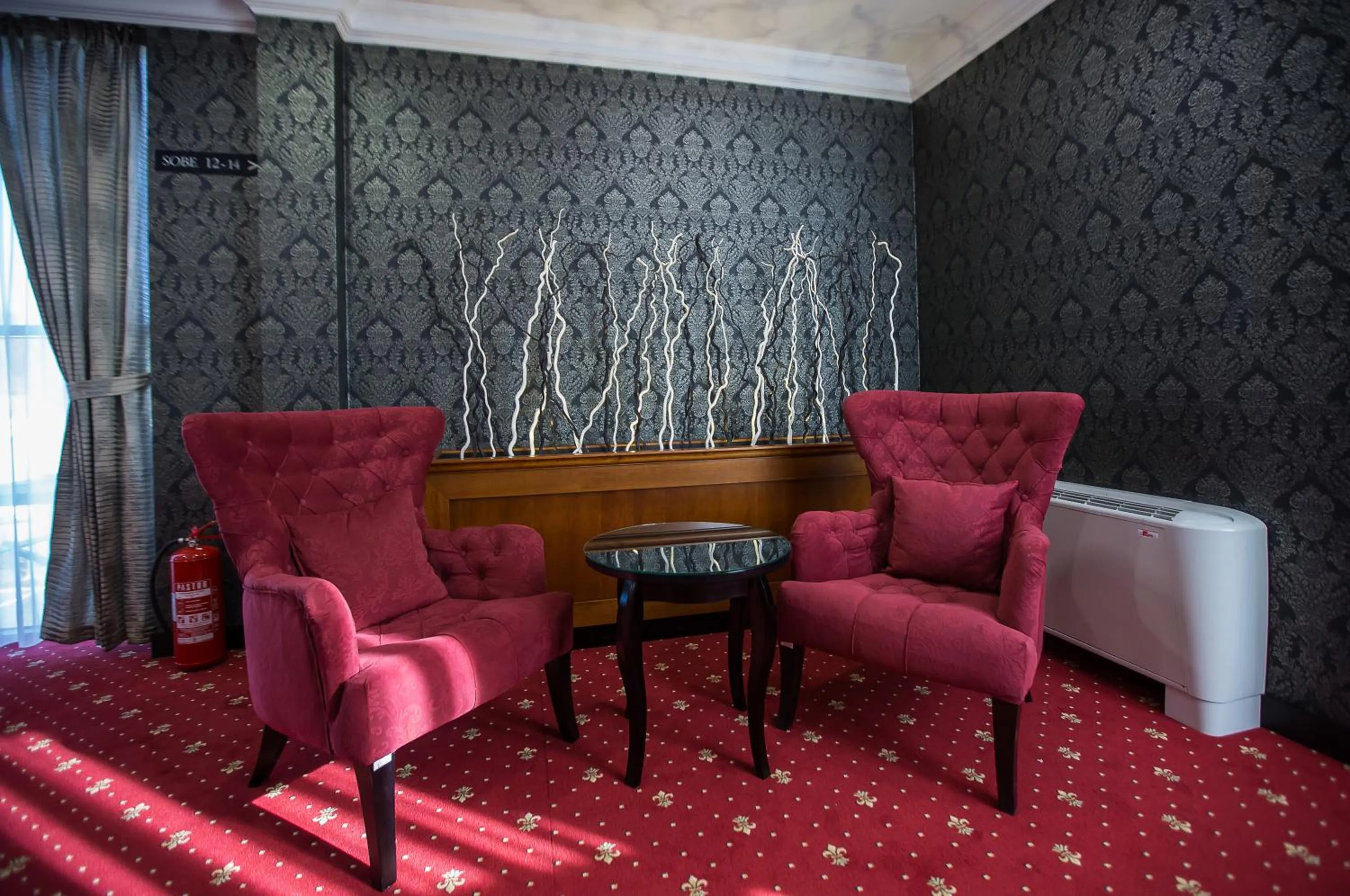 Communal lounge/ TV room in Hotel Exclusive President