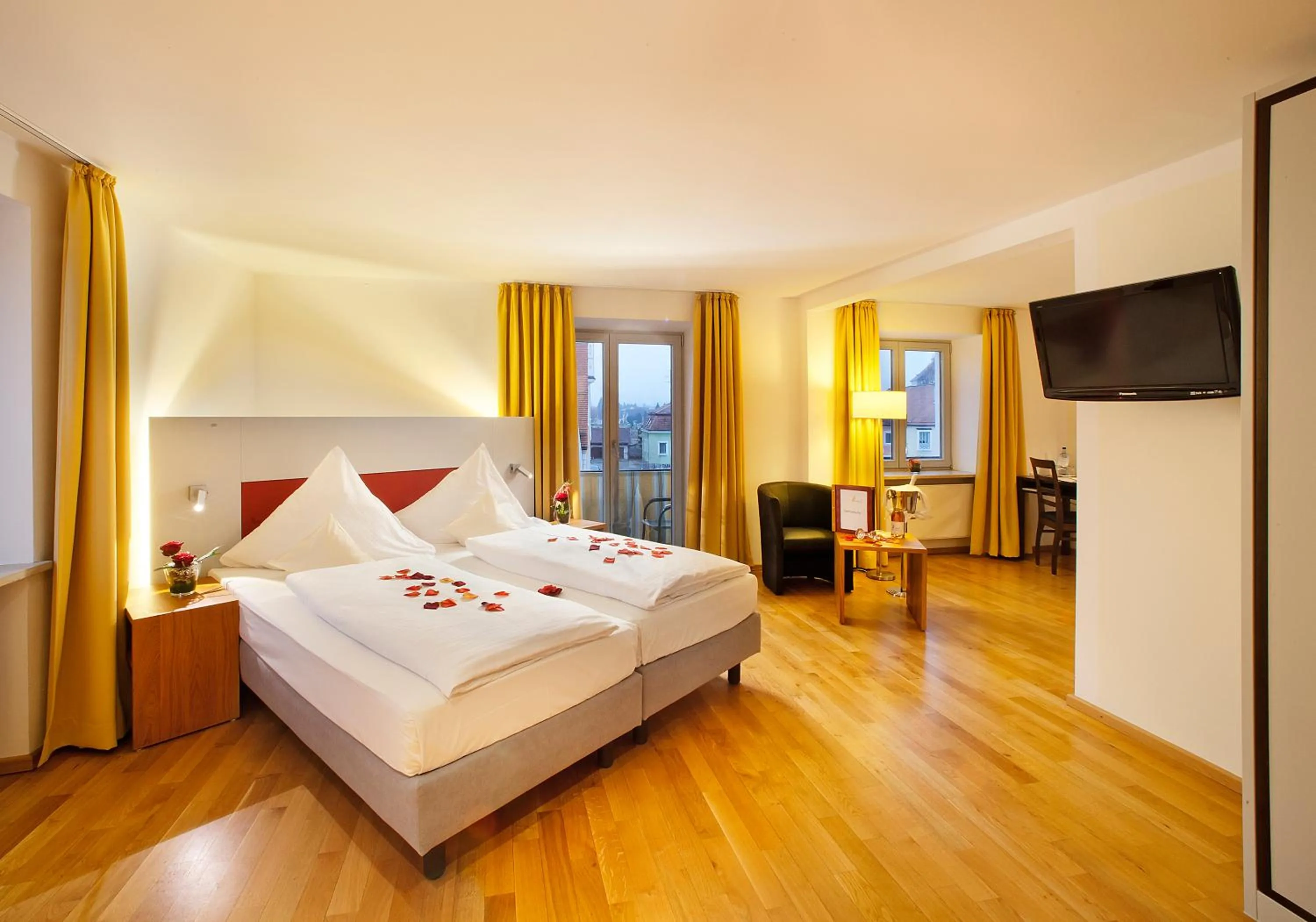 Photo of the whole room, Bed in AKZENT Brauerei Hotel Hirsch