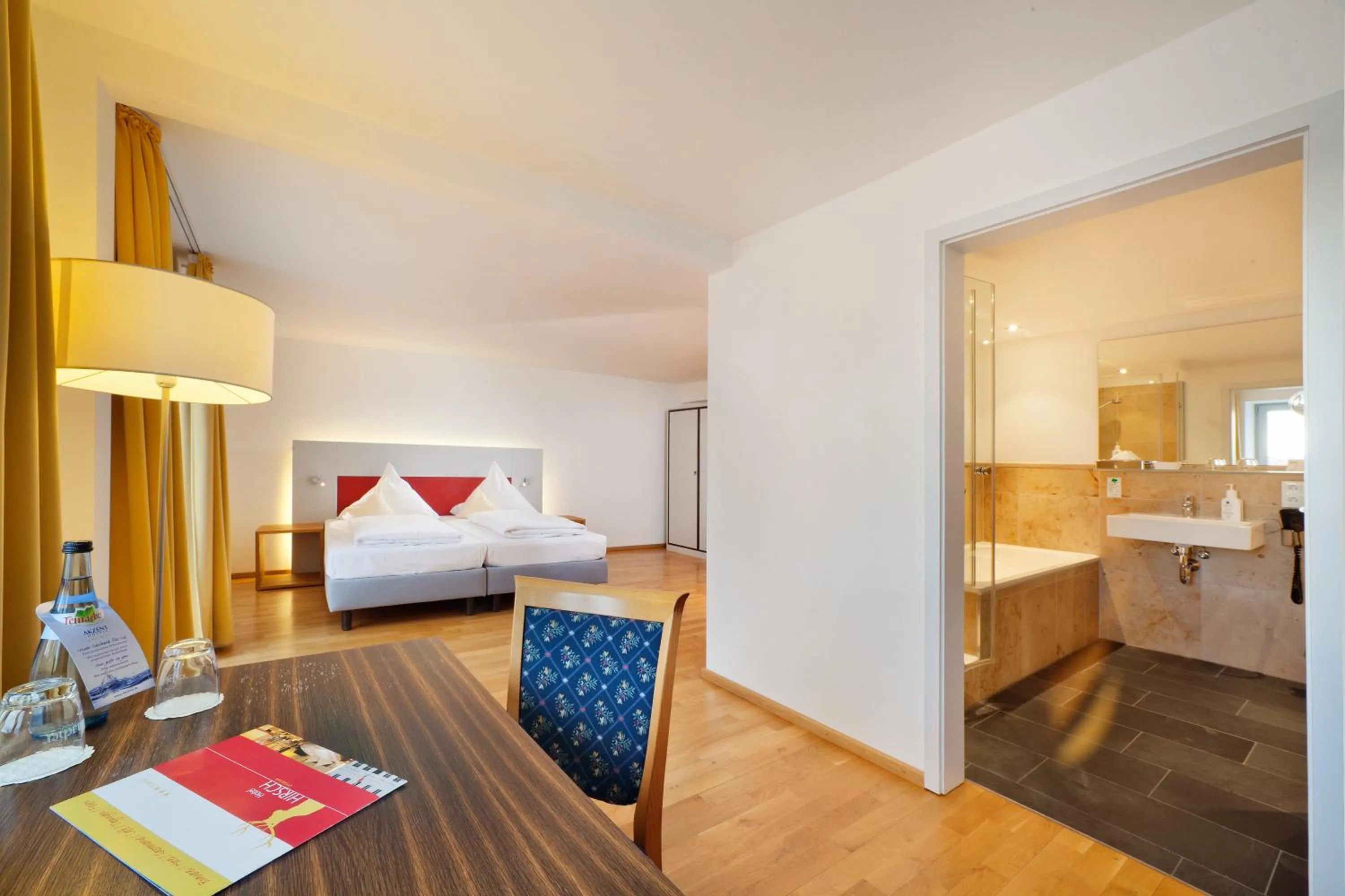 Photo of the whole room, Bed in AKZENT Brauerei Hotel Hirsch