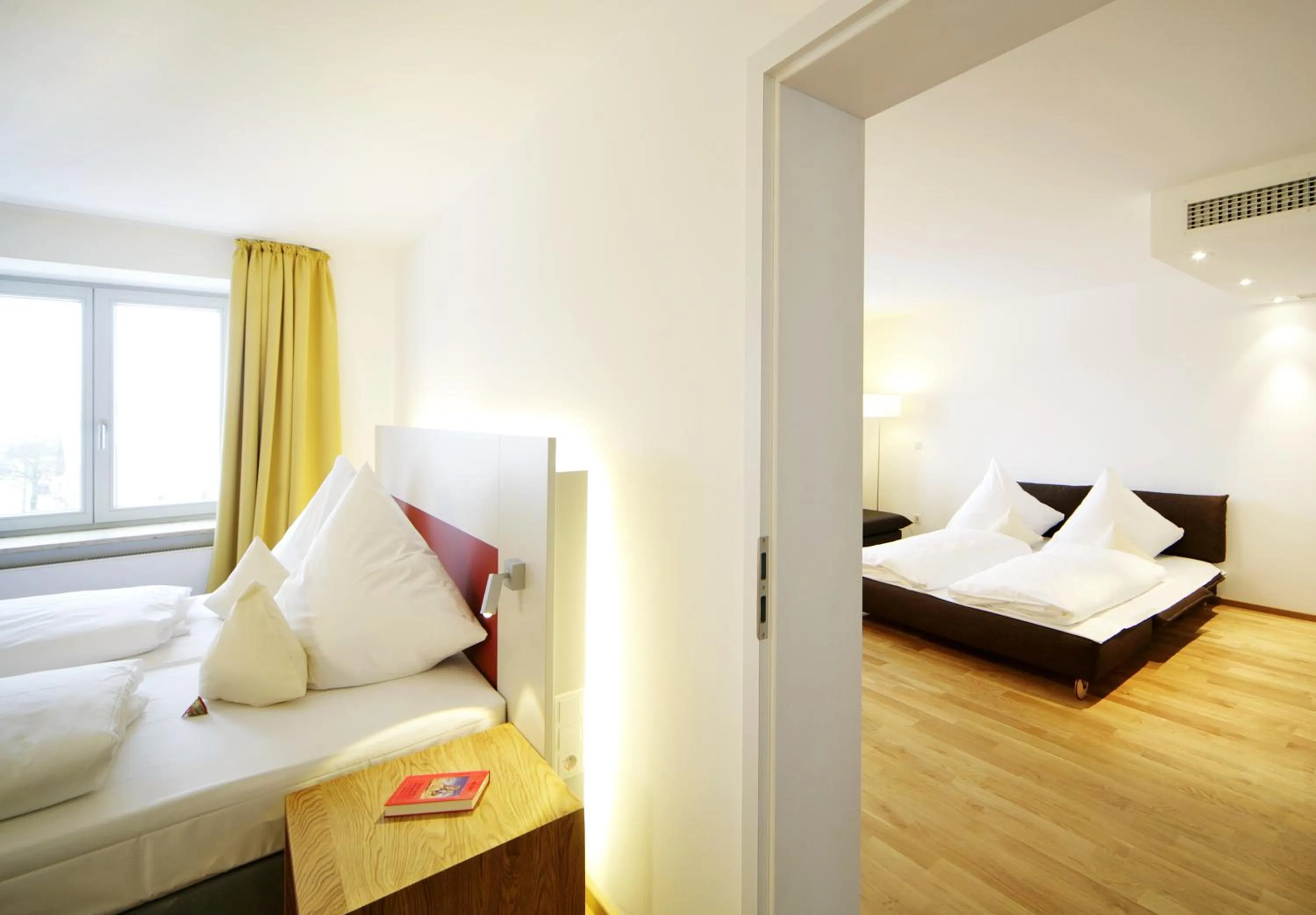 Photo of the whole room, Bed in AKZENT Brauerei Hotel Hirsch