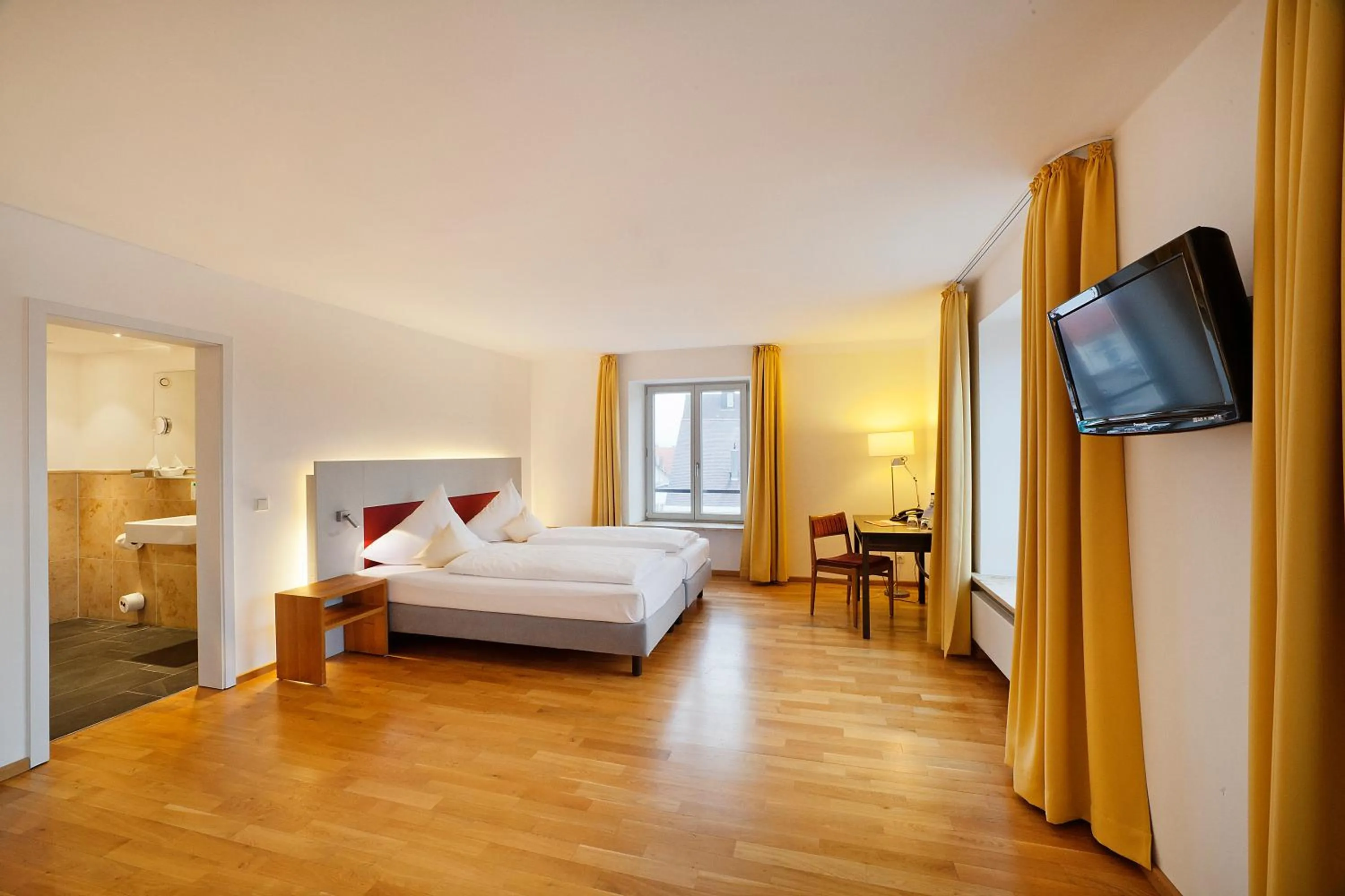 Bedroom, Bed in AKZENT Brauerei Hotel Hirsch