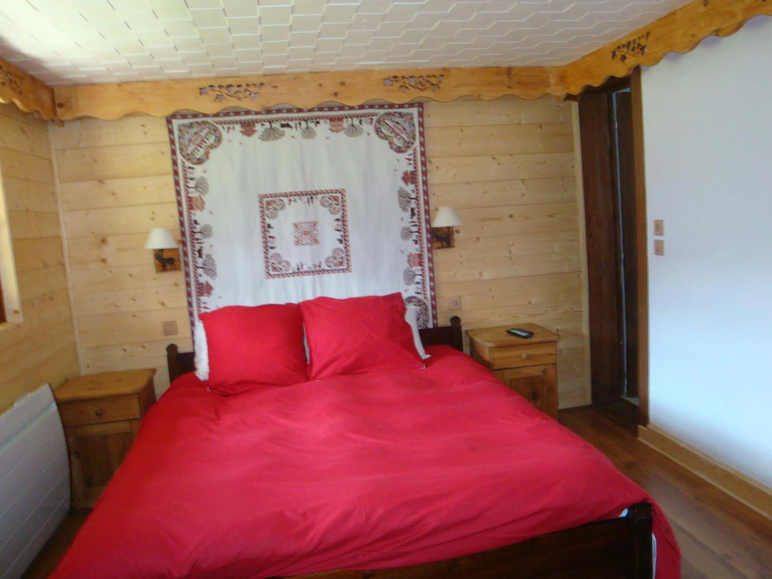 Bed in Chambres d'hôtes le génépi