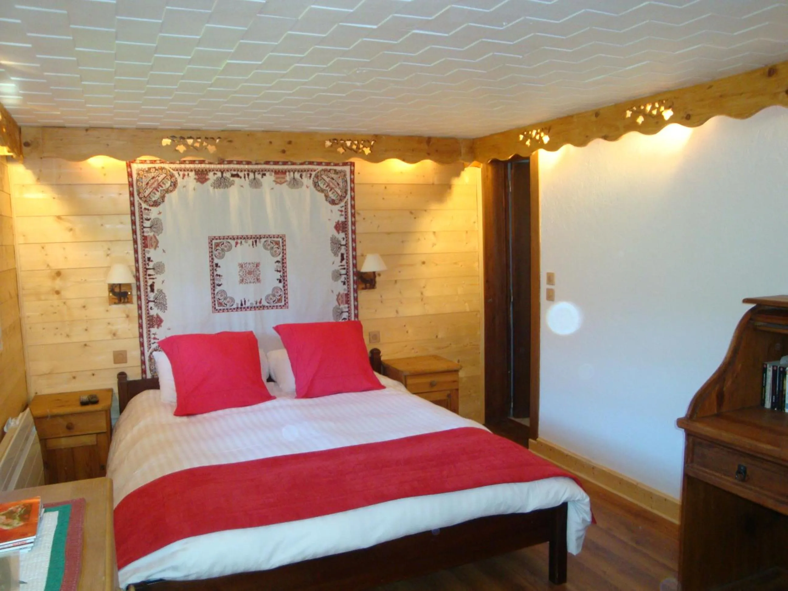 Bed in Chambres d'hôtes le génépi