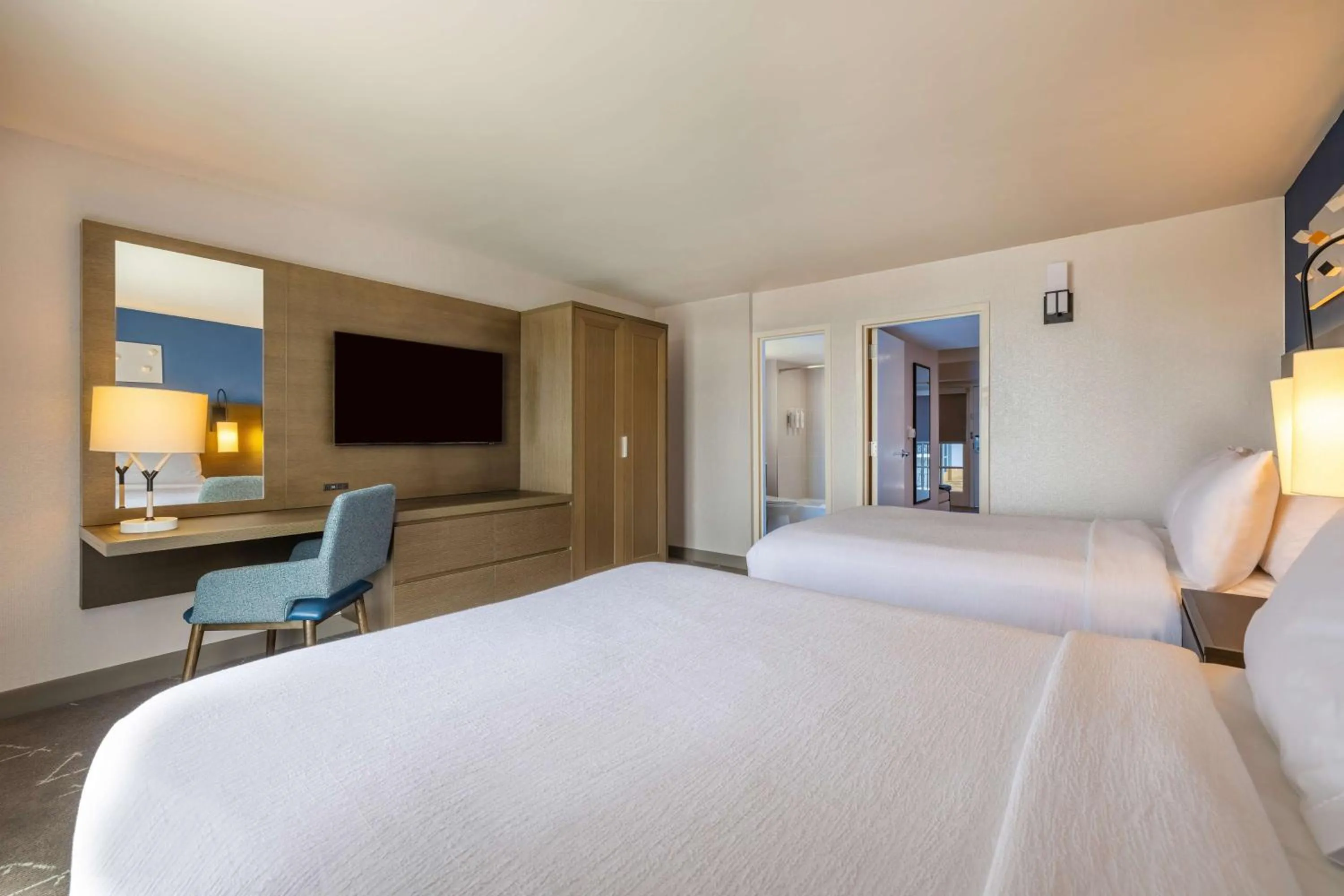 Bed in Embassy Suites by Hilton Tulsa I-44