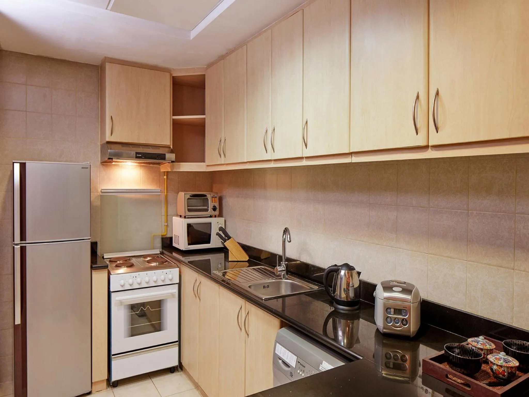 Kitchen or kitchenette in ZiQoo Hotel Apartments Dubai