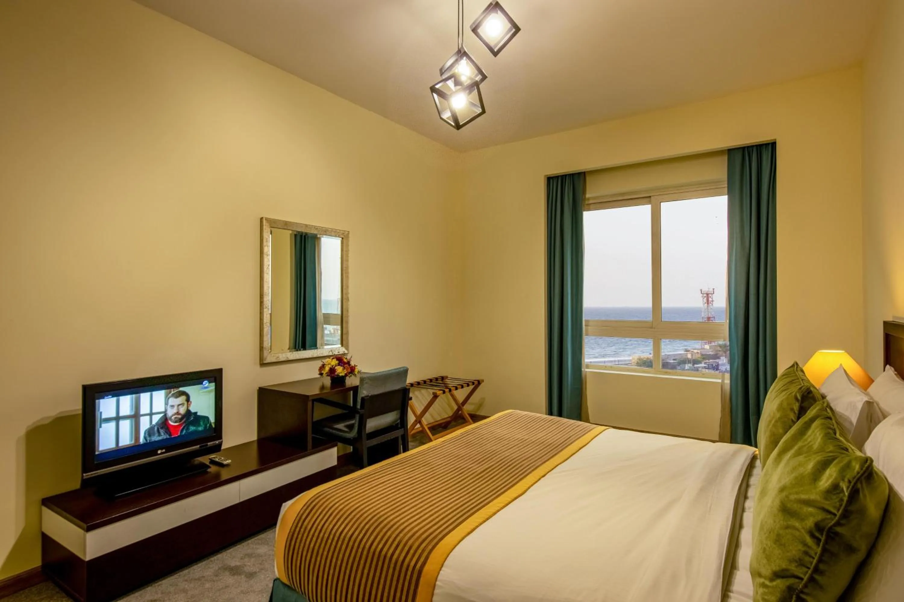 TV and multimedia, Bed in TIME Ruby Hotel Apartment