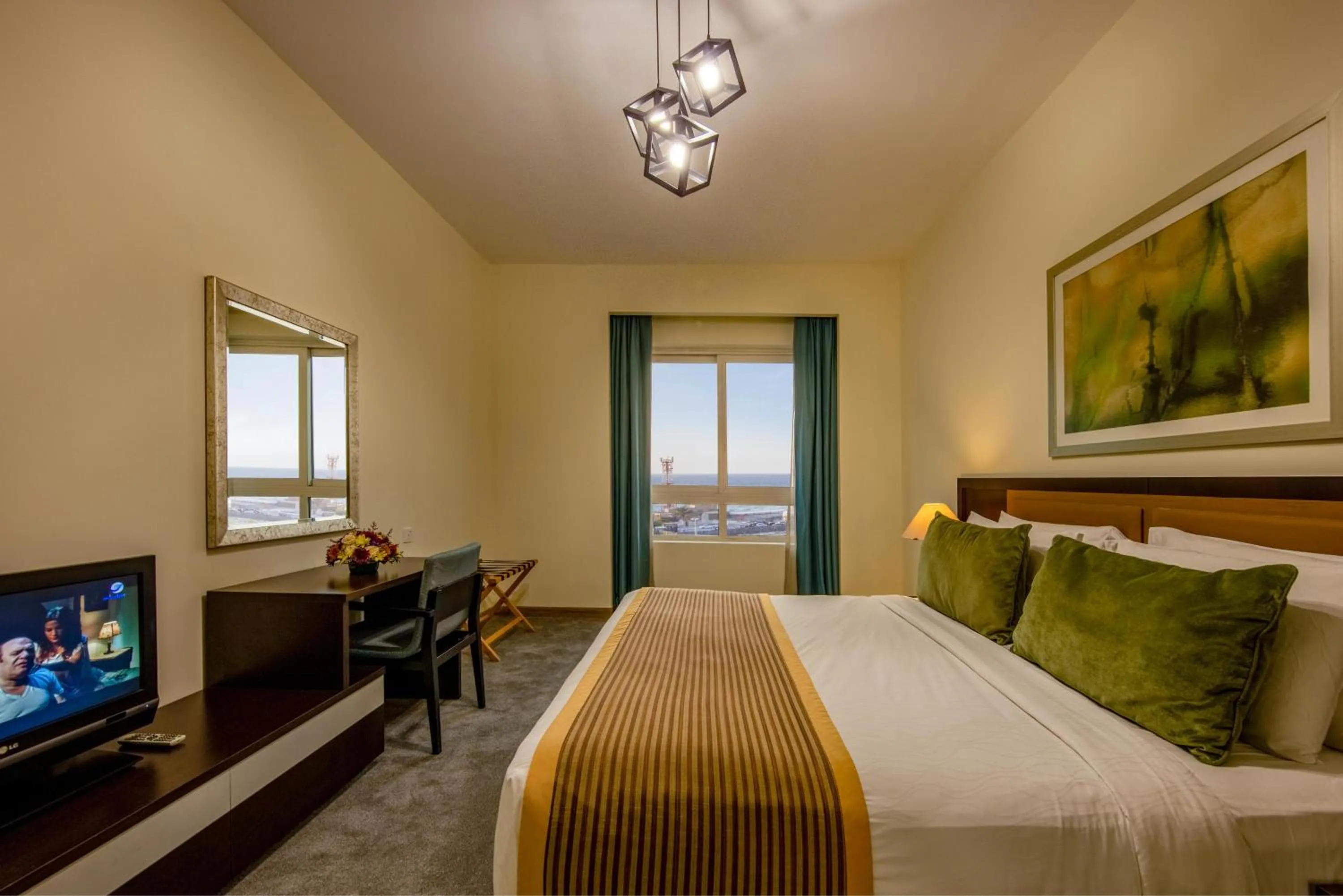 TV and multimedia, Bed in TIME Ruby Hotel Apartment