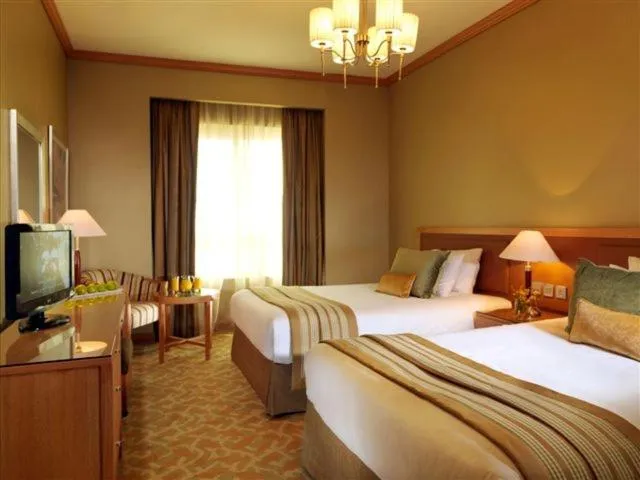 Bed in TIME Ruby Hotel Apartment