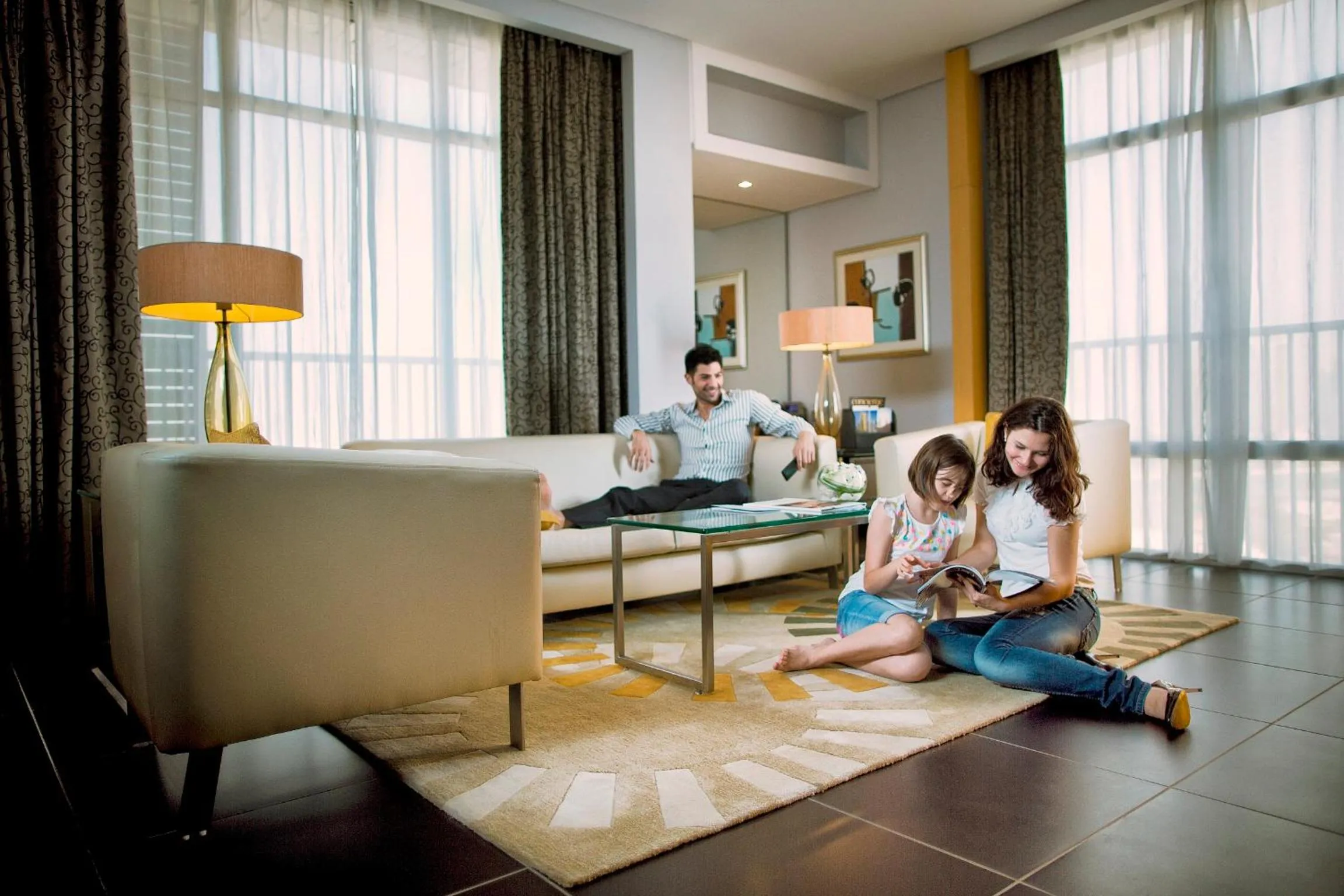 Living room in Hala Arjaan by Rotana, Deluxe Hotel Apartments