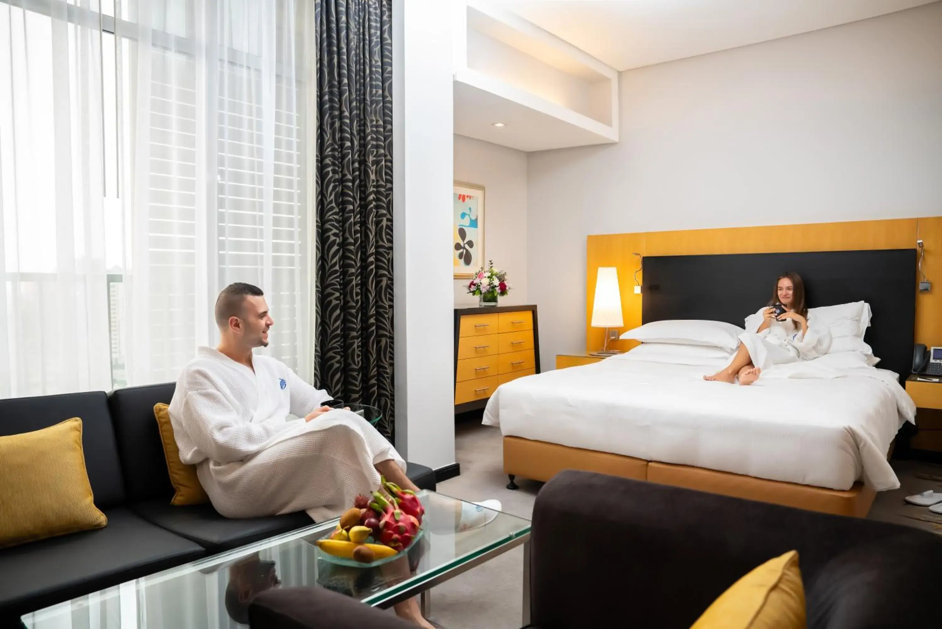 Seating area, Bed in Hala Arjaan by Rotana, Deluxe Hotel Apartments Seating area, Bed in Hala Arjaan by Rotana, Deluxe Hotel Apartments