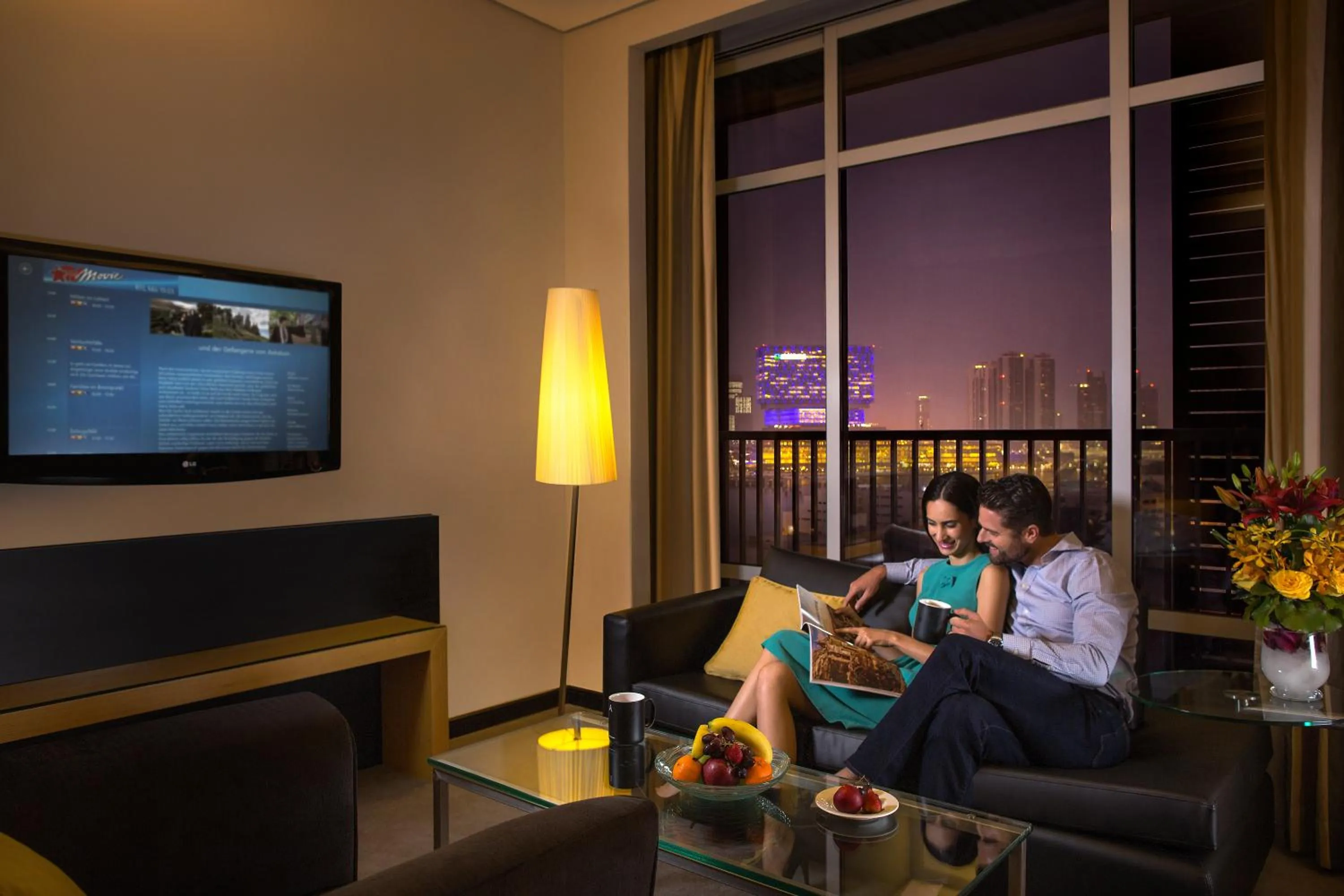 Living room in Hala Arjaan by Rotana, Deluxe Hotel Apartments