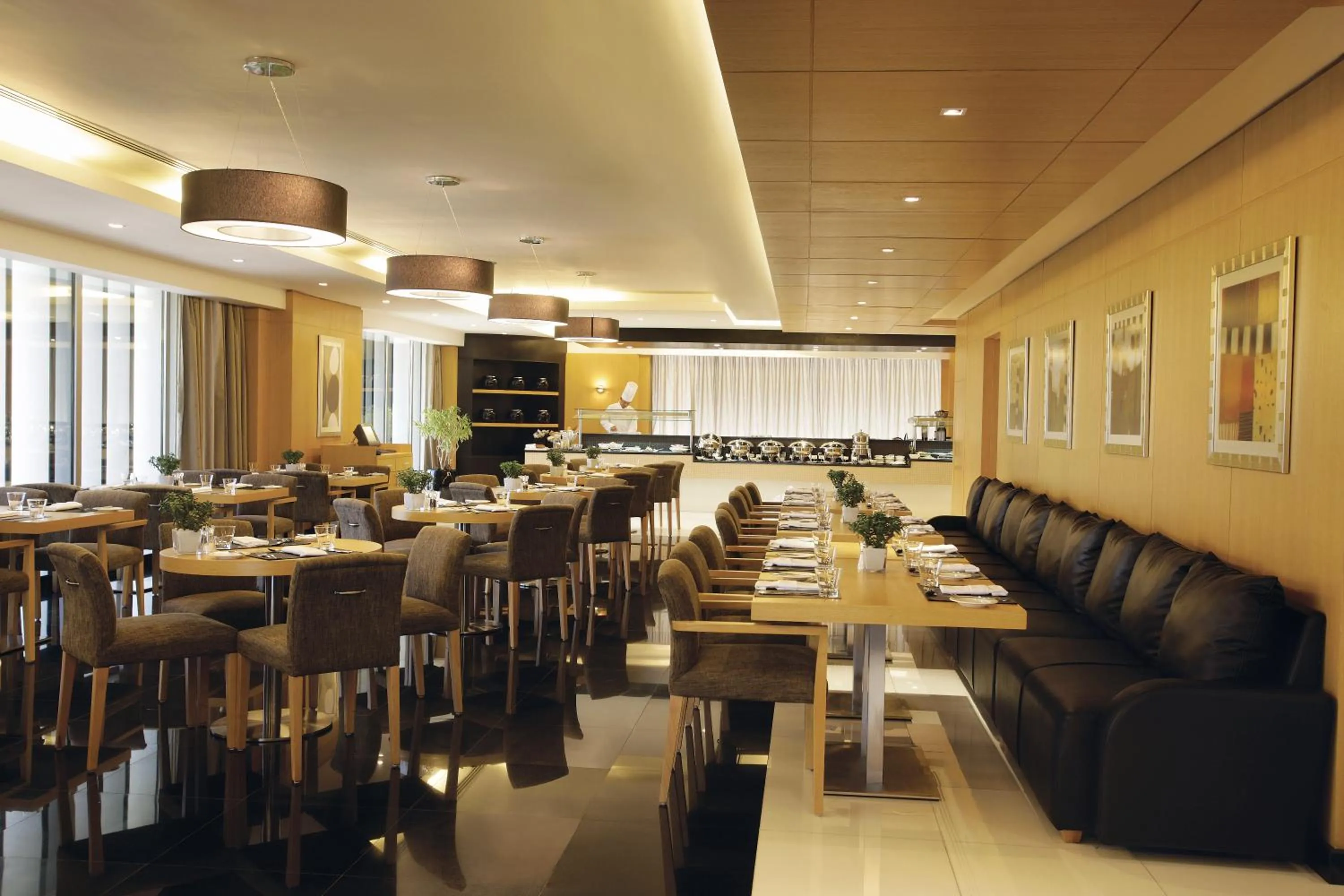 Restaurant/places to eat in Hala Arjaan by Rotana, Deluxe Hotel Apartments