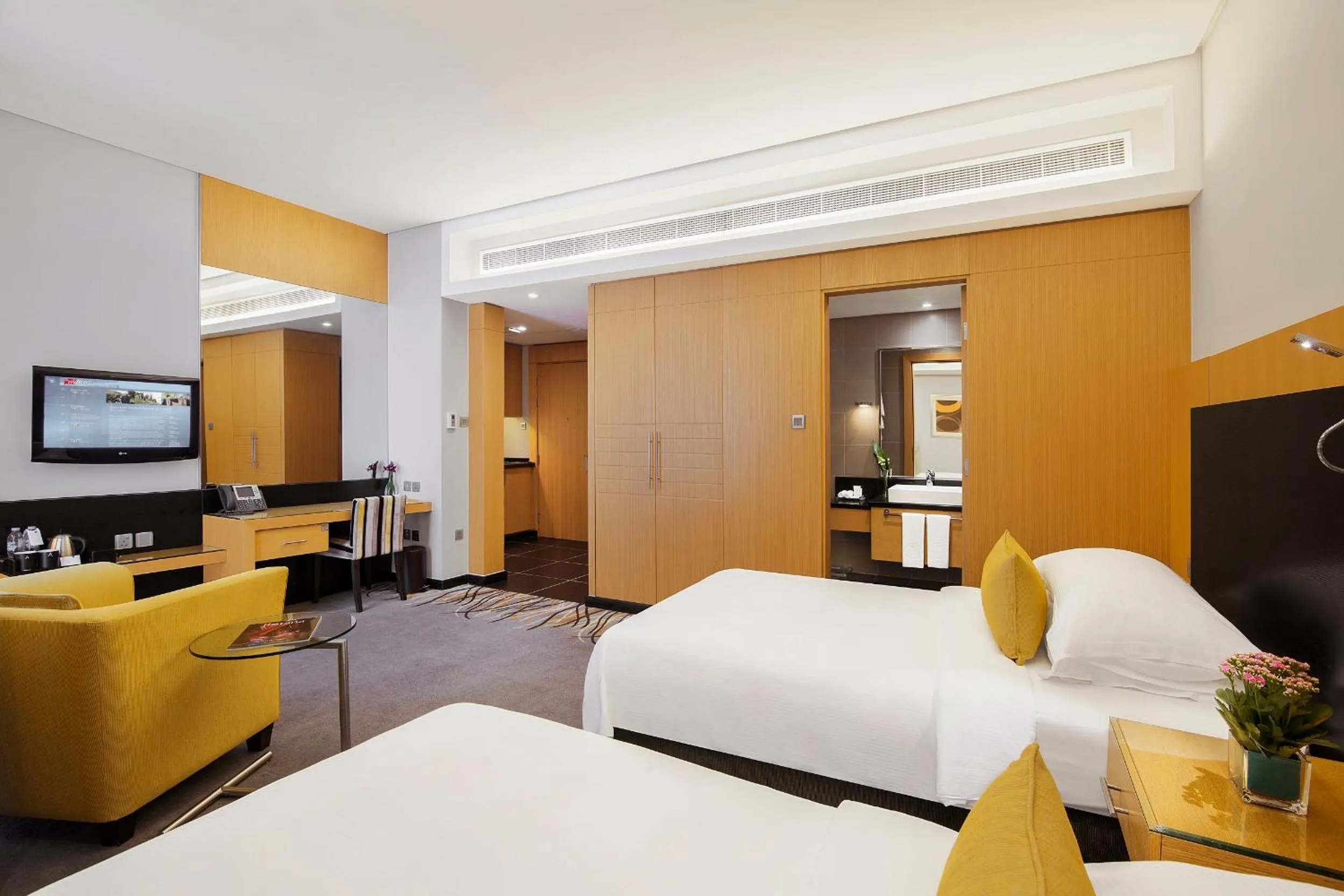 Bathroom, Bed in Hala Arjaan by Rotana, Deluxe Hotel Apartments