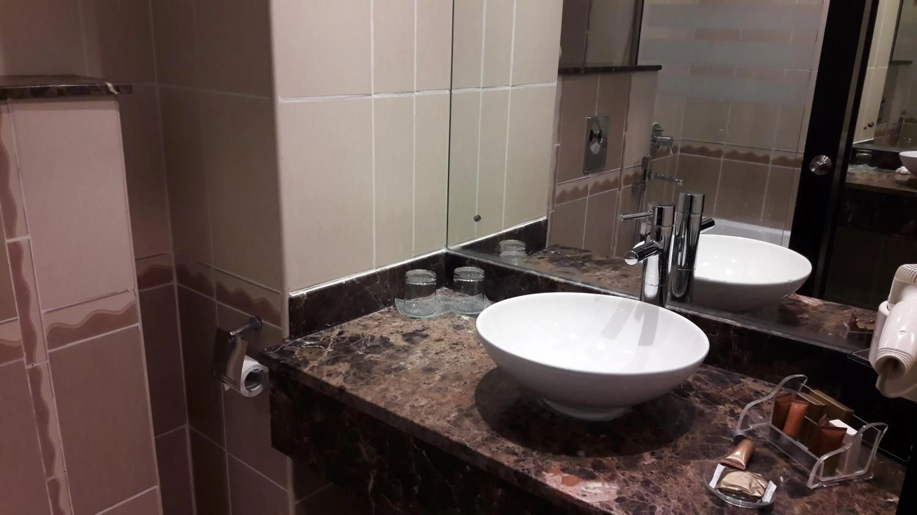 Bathroom in Landmark Riqqa Hotel
