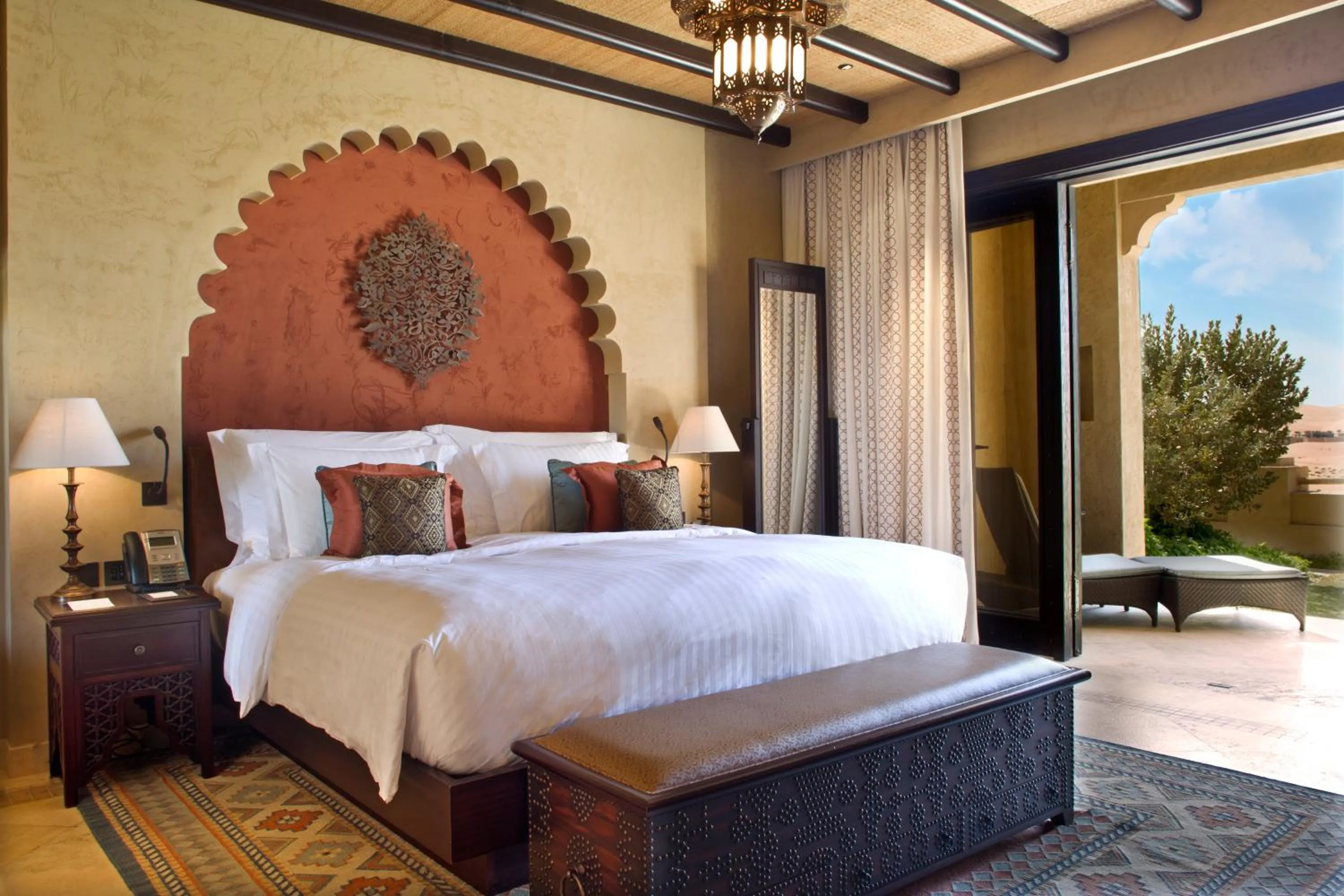 Bed in Anantara Qasr al Sarab Desert Resort